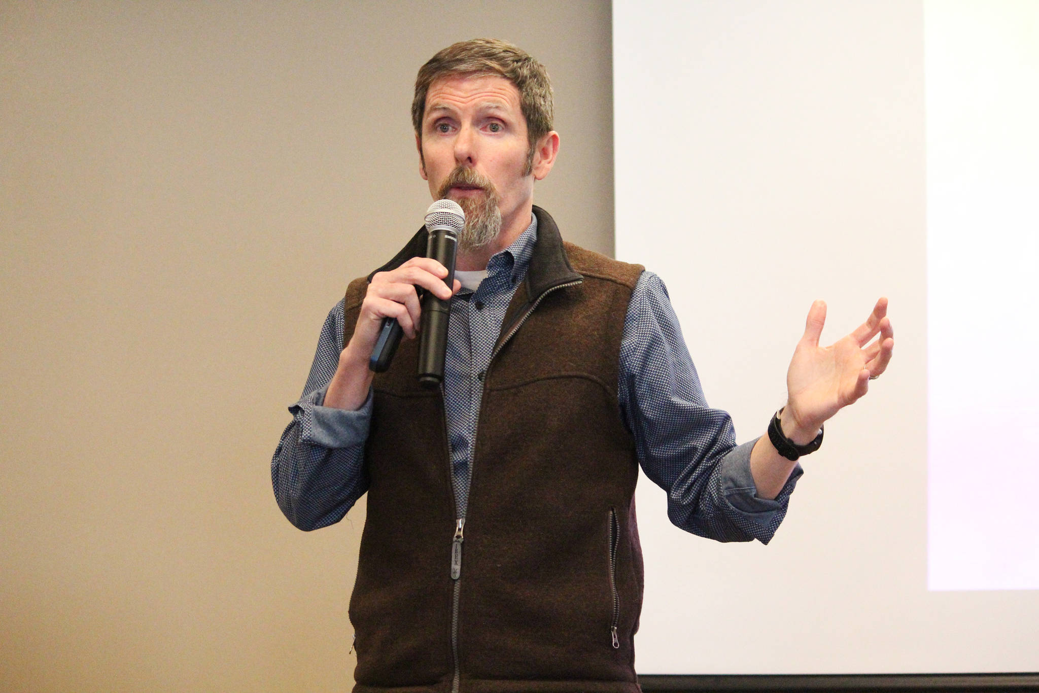 Photo by Megan Pacer/Homer News                                Mike Heatwole, vice president of public affairs for the Pebble Limited Partnership, speaks to a crowd of people Tuesday, March 19 during a community meeting at Land’s End Resort in Homer.