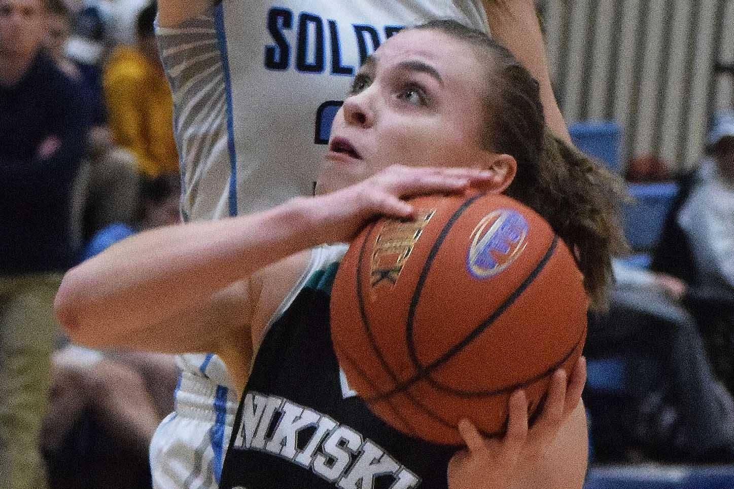 Nikiski’s Bethany Carstens drives in a nonconference game at Soldotna High School this season. (Photo by Joey Klecka/Peninsula Carion)