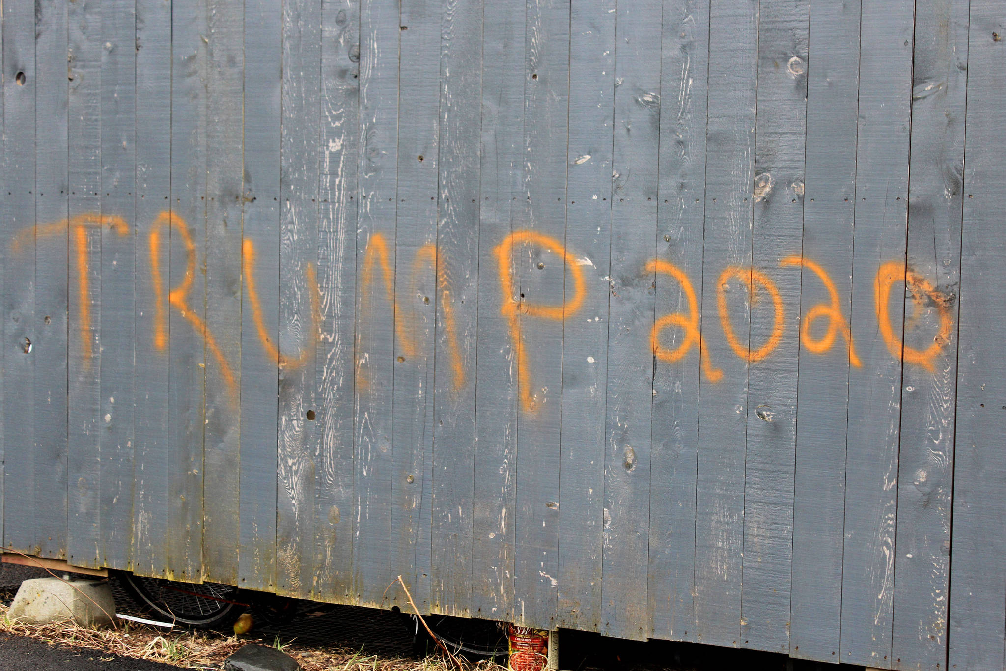 The words “Trump 2020” are spray painted onto a wall at Wasabi’s Bistro, shown here Thursday, March 21, 2019 just outside of Homer, Alaska. (Photo by Megan Pacer/Homer News)
