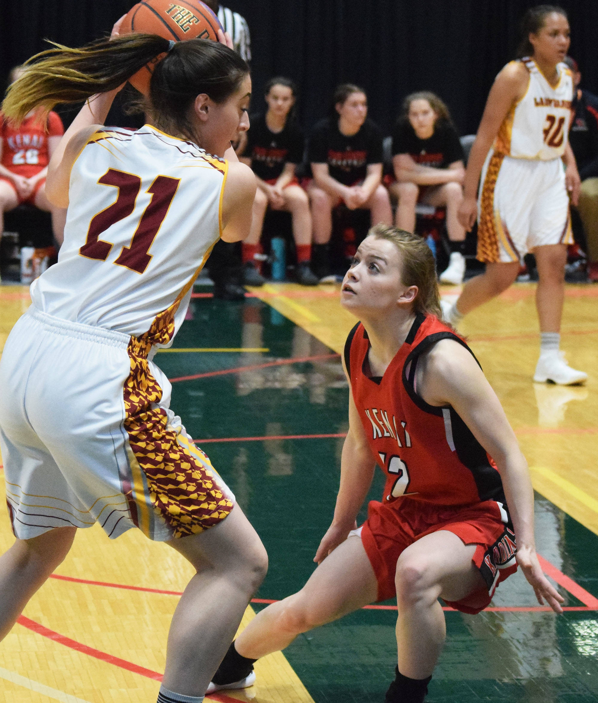 Kenai’s Hayley Maw (right) guards Mt. Edgecumbe’s Leticia Skaflestad Thursday, Mar. 21, 2019, at the Class 3A state championship tournament at the Alaska Airlines Center in Anchorage. (Photo by Joey Klecka/Peninsula Clarion)