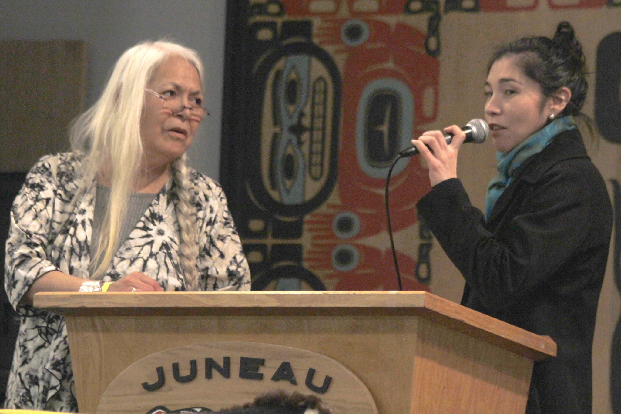 KathyHope Erickson, chair of the Sitka Tribe of Alaska Tribal Council, left, listens as Elizabeth Saagulik Hensley, attorney for Landye Bennett Blumstein LLP, gives an update on the litigation between the tribe and the State of Alaska. (Alex McCarthy | Juneau Empire)