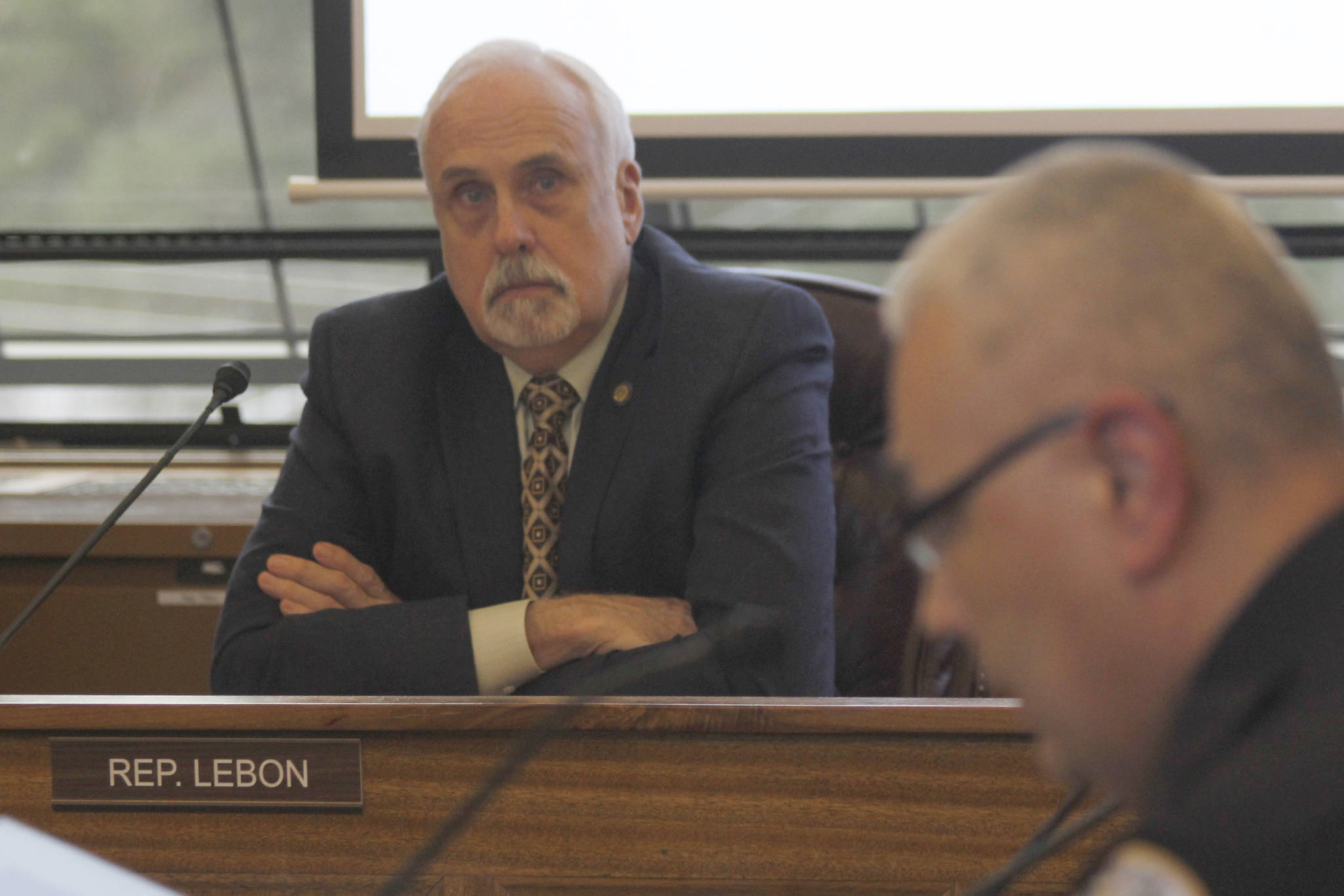 Rep. Bart LeBon, R-Fairbanks, listens to Juneau Police Chief Ed Mercer during a community meeting on the governor’s budget organized by the House Finance Committee at the Alaska State Capitol on Friday, March 22, 2019. (Alex McCarthy | Juneau Empire)
