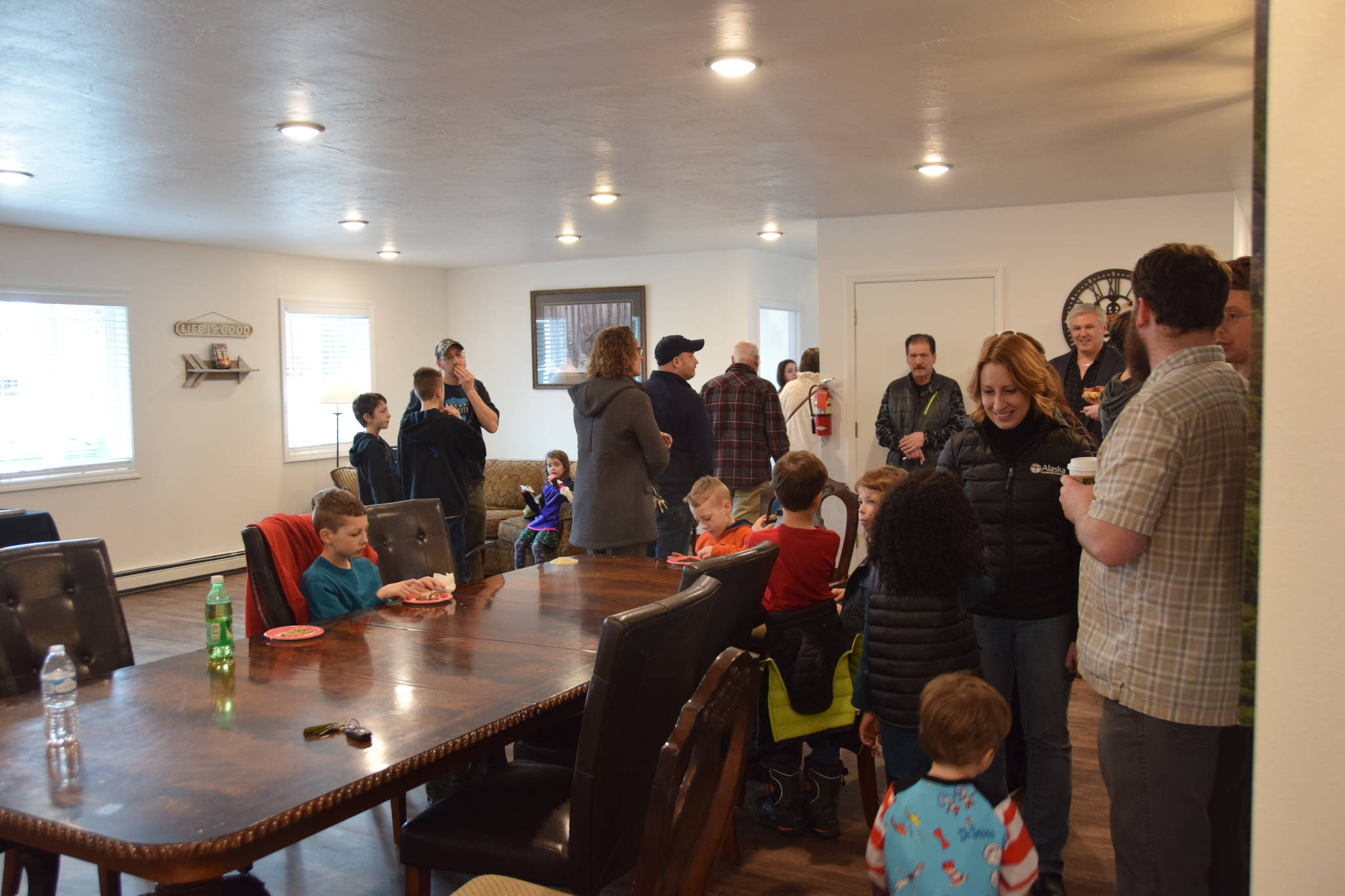 Community members show their support for the opening of Freedom House’s men’s residence in Soldotna, Alaska, on March 24, 2019. (Photo by Brian Mazurek/Peninsula Clarion)