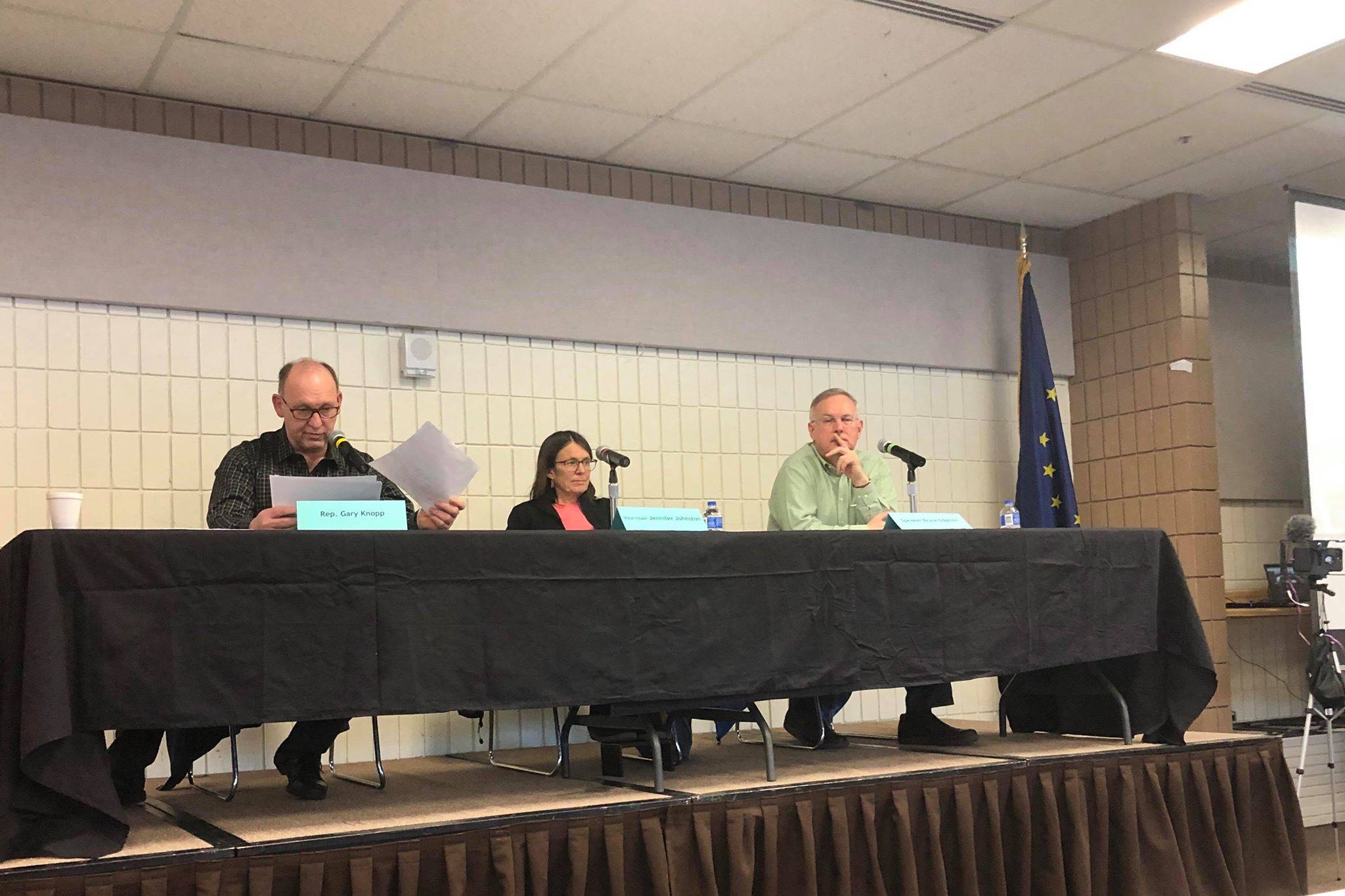 Rep. Gary Knopp (R-Kenai/Soldotna), House Speaker Bryce Edgmon (I-Dillingham) and Vice-Chair of the House Finance Committee Jennifer Johnston (R-Anchorage) listen to public testimony at a local House Finance Committee meeting at the Soldotna Regional Sports Complex on Saturday, March 23, 2019 in Soldotna, Alaska. (Photo by Victoria Petersen/Peninsula Clarion)