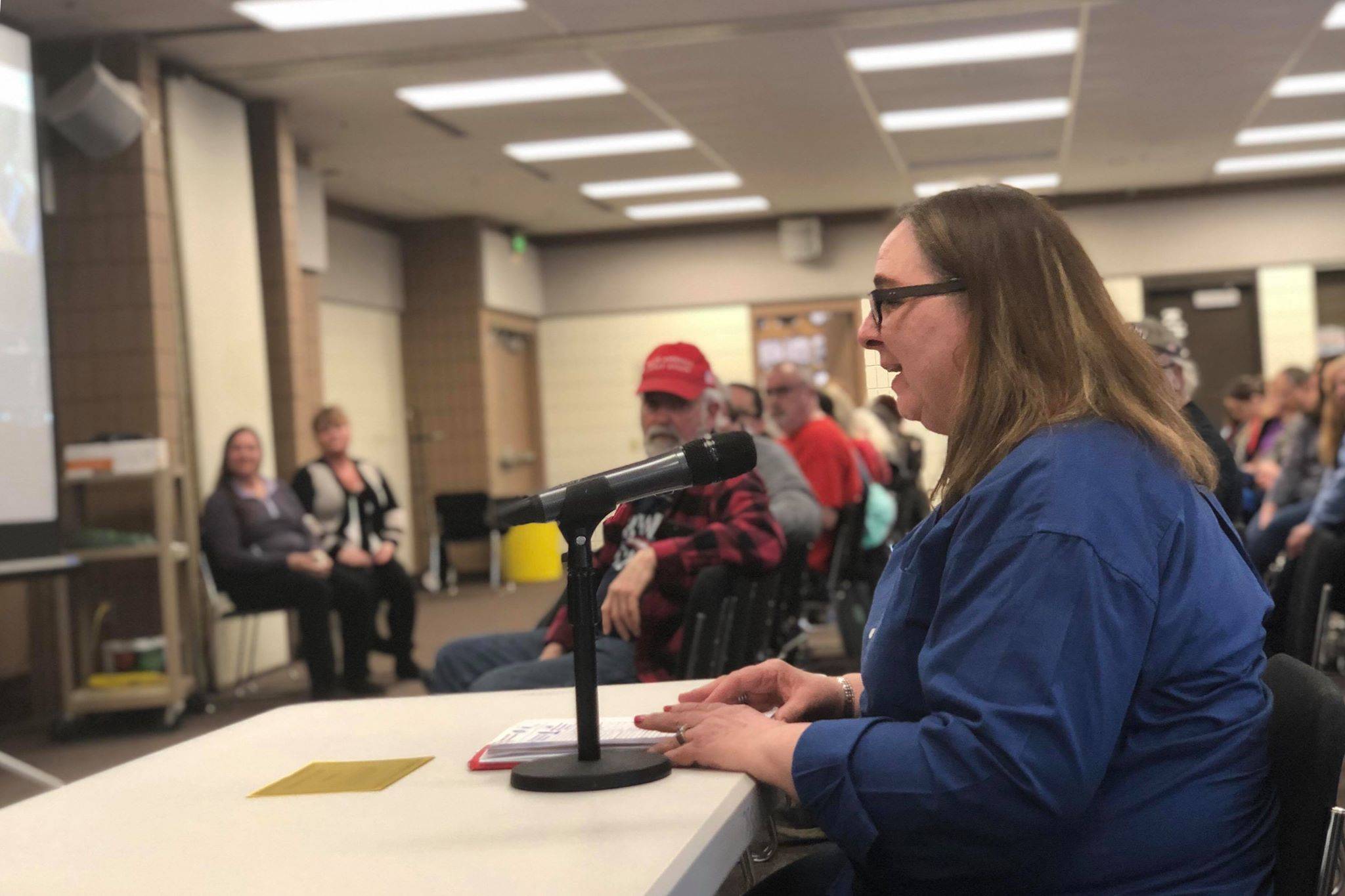 Leslie Rohr from Love INC speaks to the House Finance Committee members in opposition to cuts that help vulnerable Alaskans on Saturday, March 23, 2019, at the Soldotna Regional Sports Complex in Soldotna, Alaska. (Photo by Victoria Petersen/Peninsula Clarion)