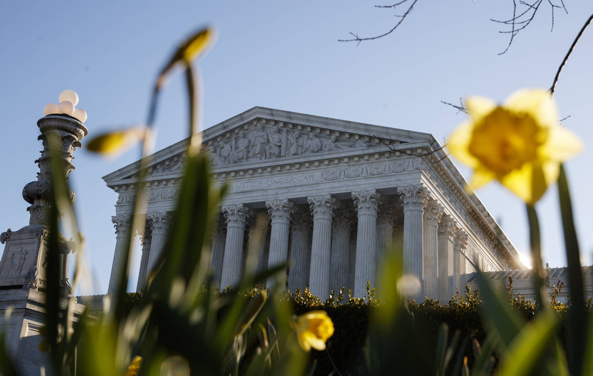 The Supreme Court building is seen on Capitol Hill in Washington, Tuesday. The Supreme Court is returning to arguments over whether the political task of redistricting can be overly partisan. (AP Photo/Carolyn Kaster)