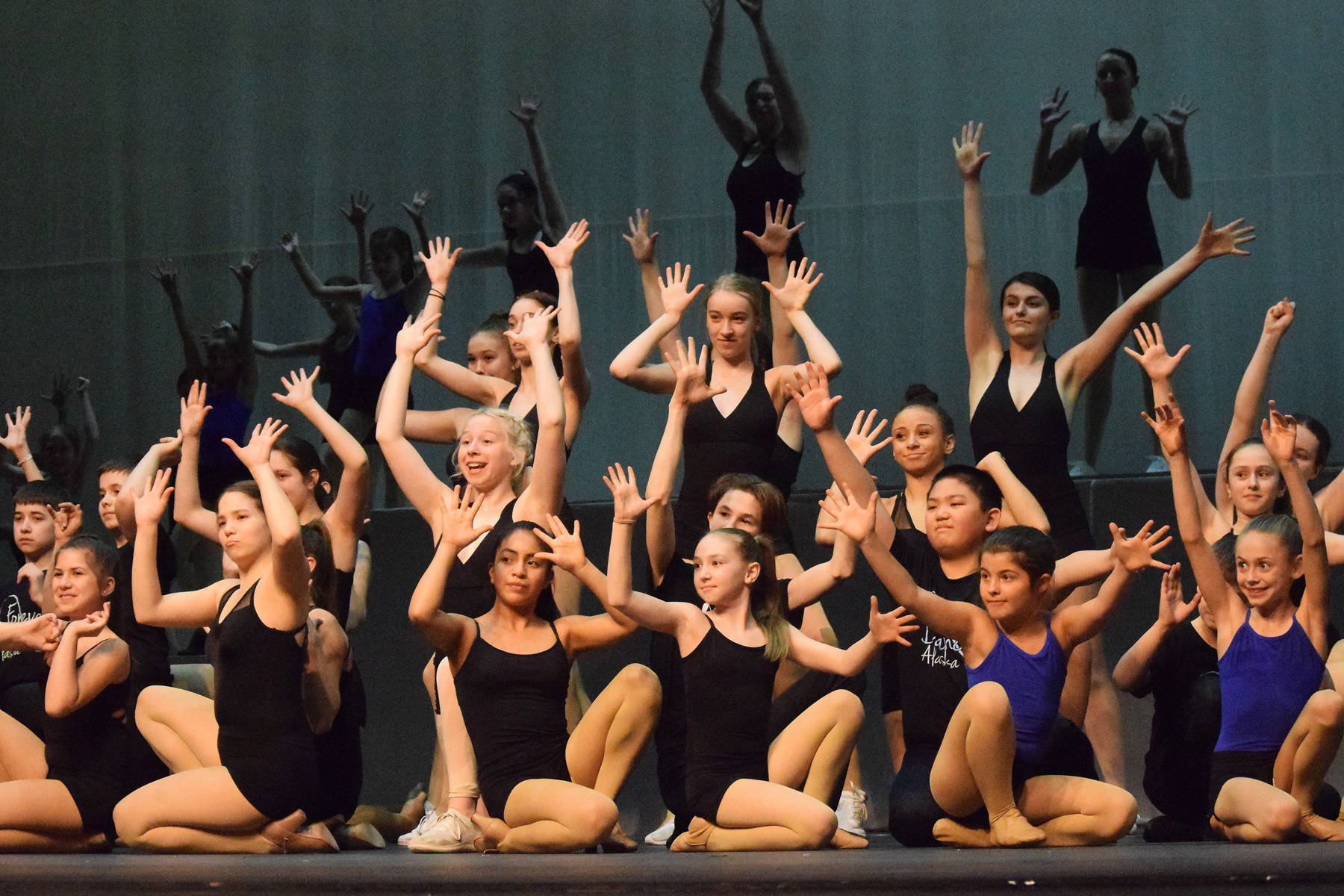 Youth members of Forever Dance Alaska take part in rehearsal Tuesday, March 26, 2019, at the Renee Hendersen Auditorium at Kenai Central High School, in Kenai, Alaska, for the company’s production of “Best of Broadway.” (Photo by Joey Klecka/Peninsula Clarion)