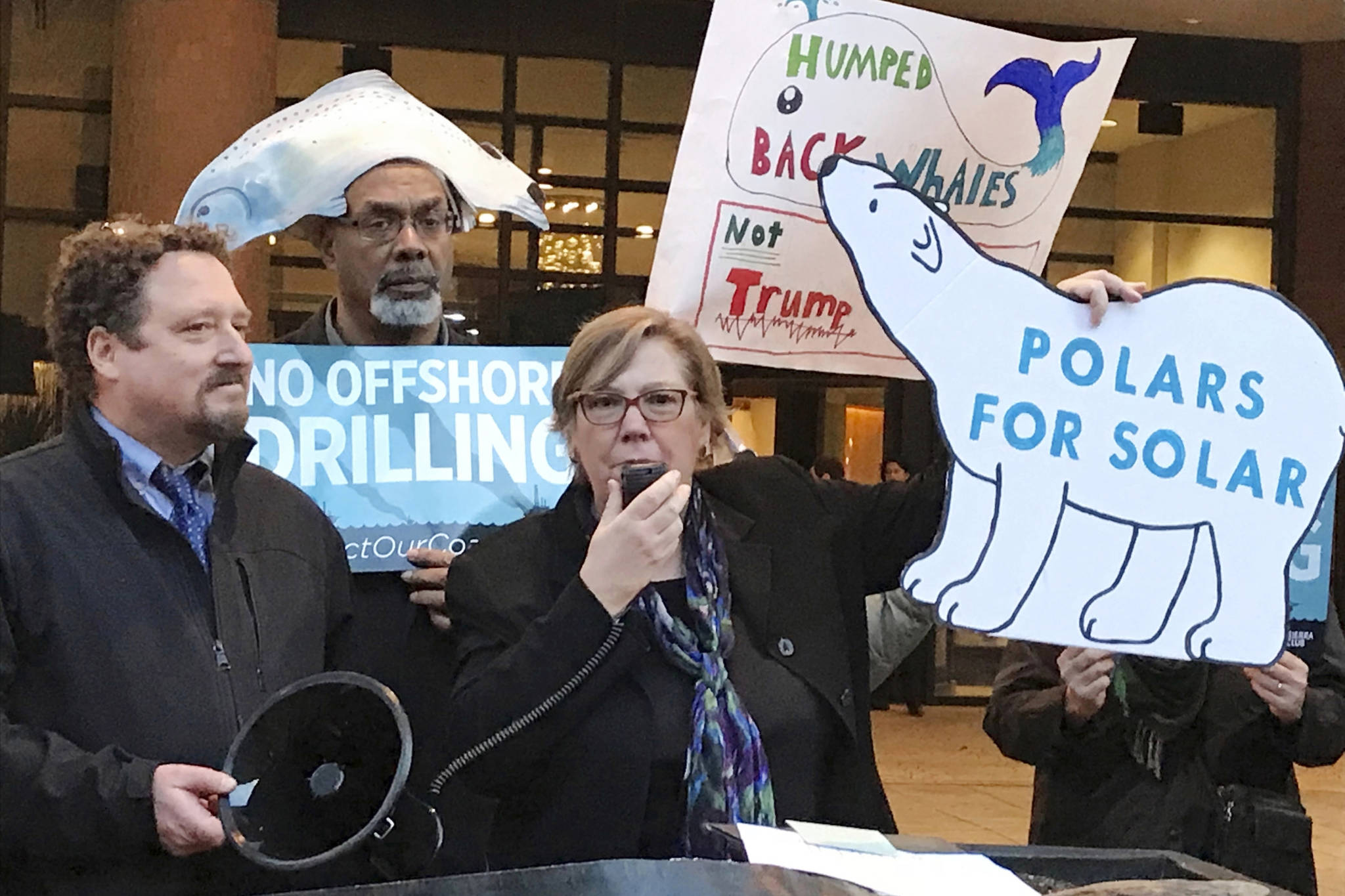 In this Feb. 15, 2018 file photo, Judith Enck, center, former regional administrator for the Environmental Protection Agency addresses those gathered at a protest against President Trump’s plan to expand offshore drilling for oil and gas in Albany, N.Y. A U.S. judge in Alaska says President Donald Trump exceeded his authority when he reversed a ban on offshore drilling in vast parts of the Arctic Ocean and dozens of canyons in the Atlantic Ocean. Judge Sharon Gleason in a ruling late Friday, March 29, 2019 threw out Trump‚Äôs executive order that overturned the ban implemented by President Barack Obama.(AP Photo/David Klepper, File)