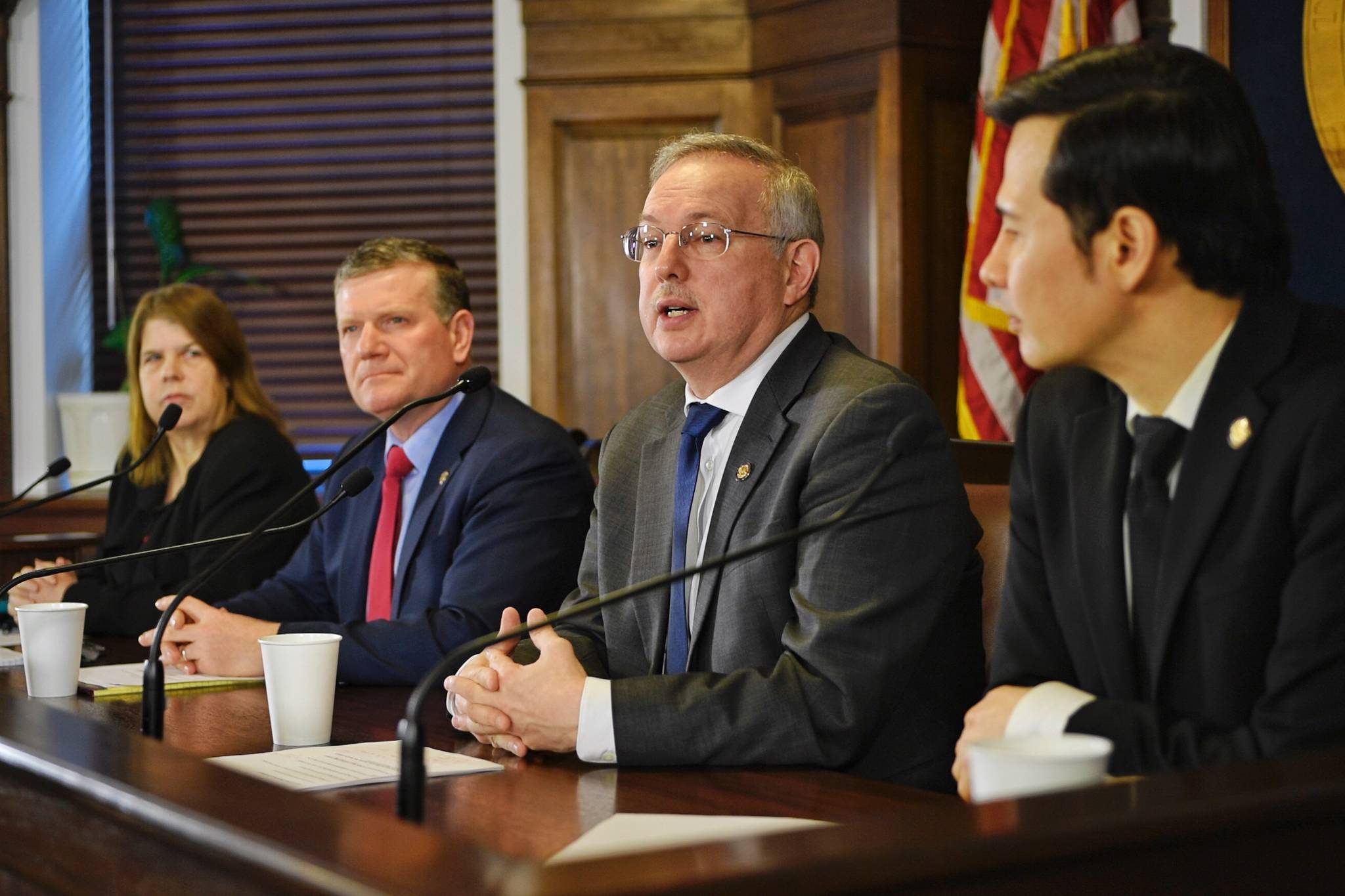 Speaker of the House Bryce Edgmon, I-Dillingham, second from right, speaks during a House Majority press conference at the Capitol on Thursday, March 28, 2019. Also attending the conference are Finance Committee co-chairs, Reps. Neal Foster, D-Nome, right and Tammie Wilson, R-North Pole, left, as well as Rep. Chuck Kopp, R-Anchorage, Chair of the Rules Committee. (Michael Penn | Juneau Empire)