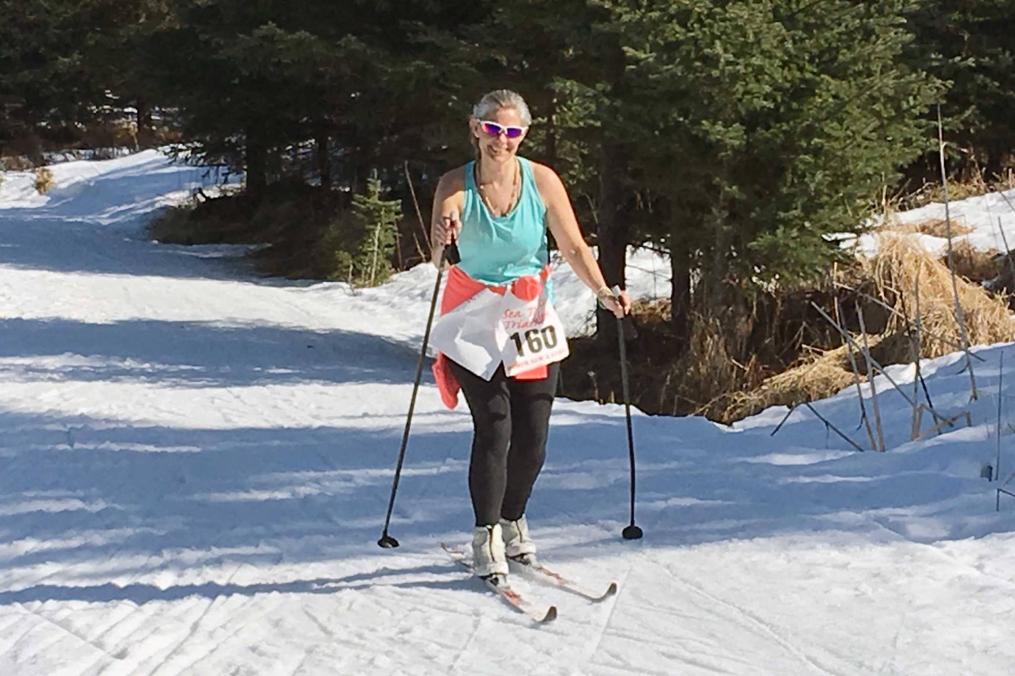 A skier from the women’s team “sarahlisa” competes at the Sea to Ski Triathlon in Homer, Alaska, on Sunday, March 31, 2019. (Photo by Jeff Helminiak/Peninsula Clarion)