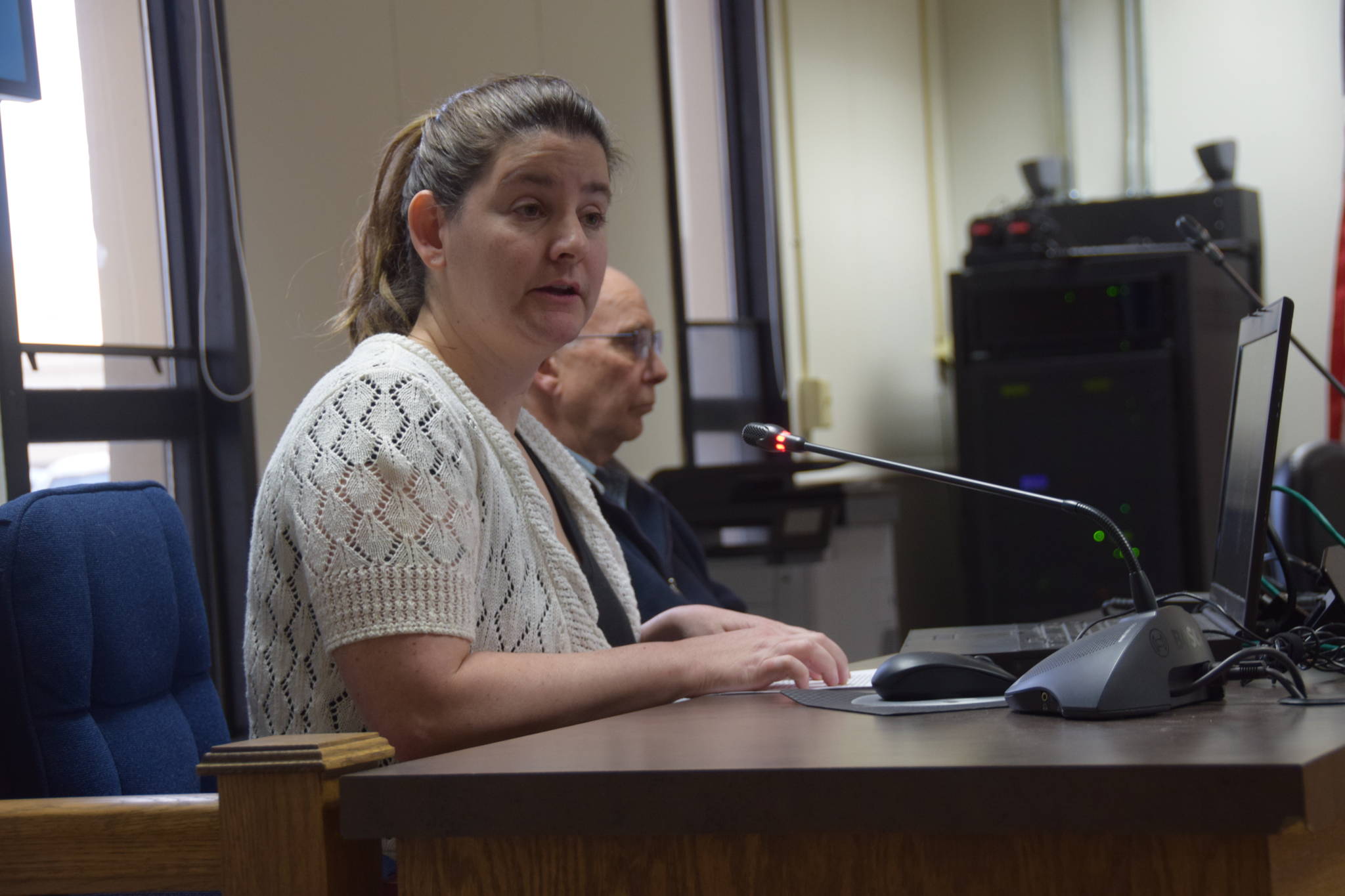 Rebecca Carnell, Director of Nursing and Clinical Services at 1st Choice Home Health Care, gives a presentation to the Kenai Peninsula Borough Assembly on April 2, 2019. (Photo by Brian Mazurek/Peninsula Clarion)