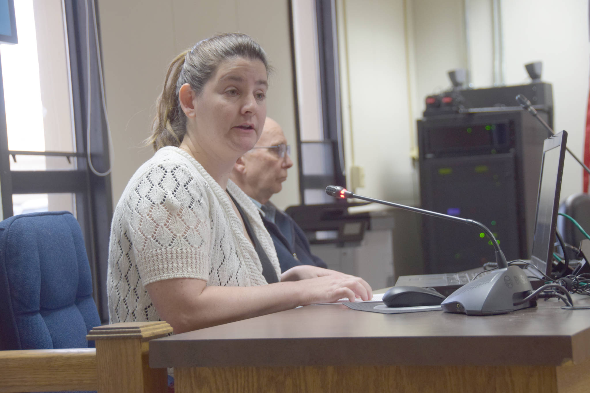 Rebecca Carnell, Director of Nursing and Clinical Services at 1st Choice Home Health Care, gives a presentation to the Kenai Peninsula Borough Assembly at the Borough Assembly Chambers on Tuesday in Soldotna. (Photo by Brian Mazurek/Peninsula Clarion)