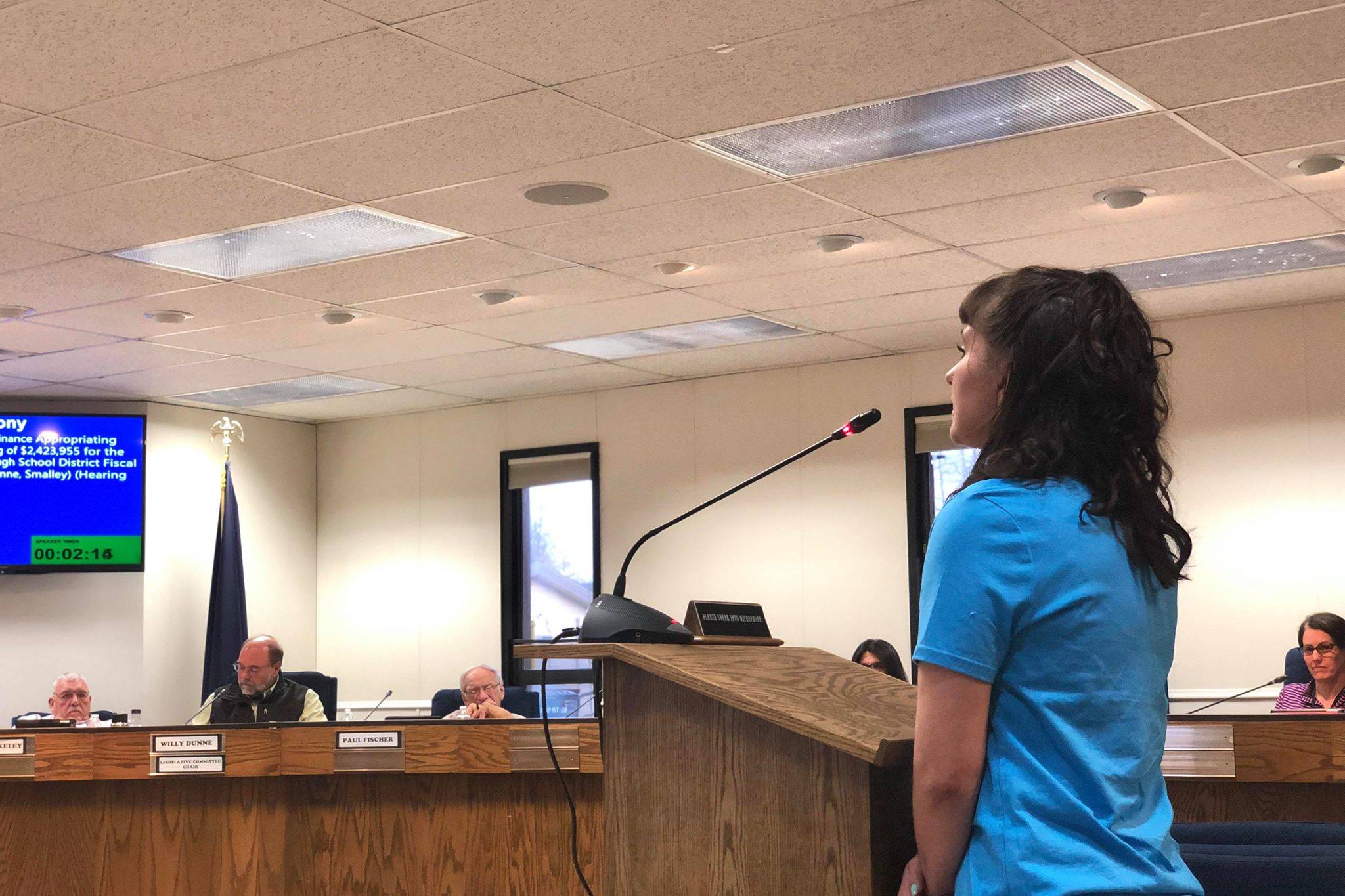 First-year Chapman School teacher Malia Larson speaks to the Kenai Peninsula Borough Assembly in support of an ordinance that will appropriate around $2.4 million to the school district in hopes of retaining some non-tenured teachers for the next school year in Soldotna, Alaska, on Tuesday, April 2, 2019. (Photo by Victoria Petersen/Peninsula Clarion)
