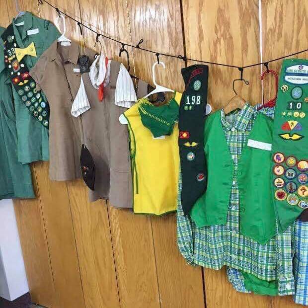 Vintage Girl Scout uniforms, from the 1950s to the 1980s on display at the Girl Scouts 60th anniversary Reunion Tea, Sunday, March 31, 2019, in Kenai, Alaska. (Photo courtesy of Rosemary Pilatti)