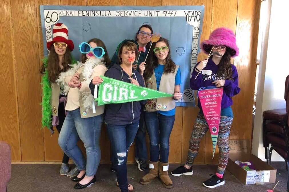 A local Girl Scout Troop poses for a photo at the Girl Scouts 60th anniversary Reunion Tea, Sunday, March 31, 2019, in Kenai, Alaska. (Photo courtesy of Rosemary Pilatti)