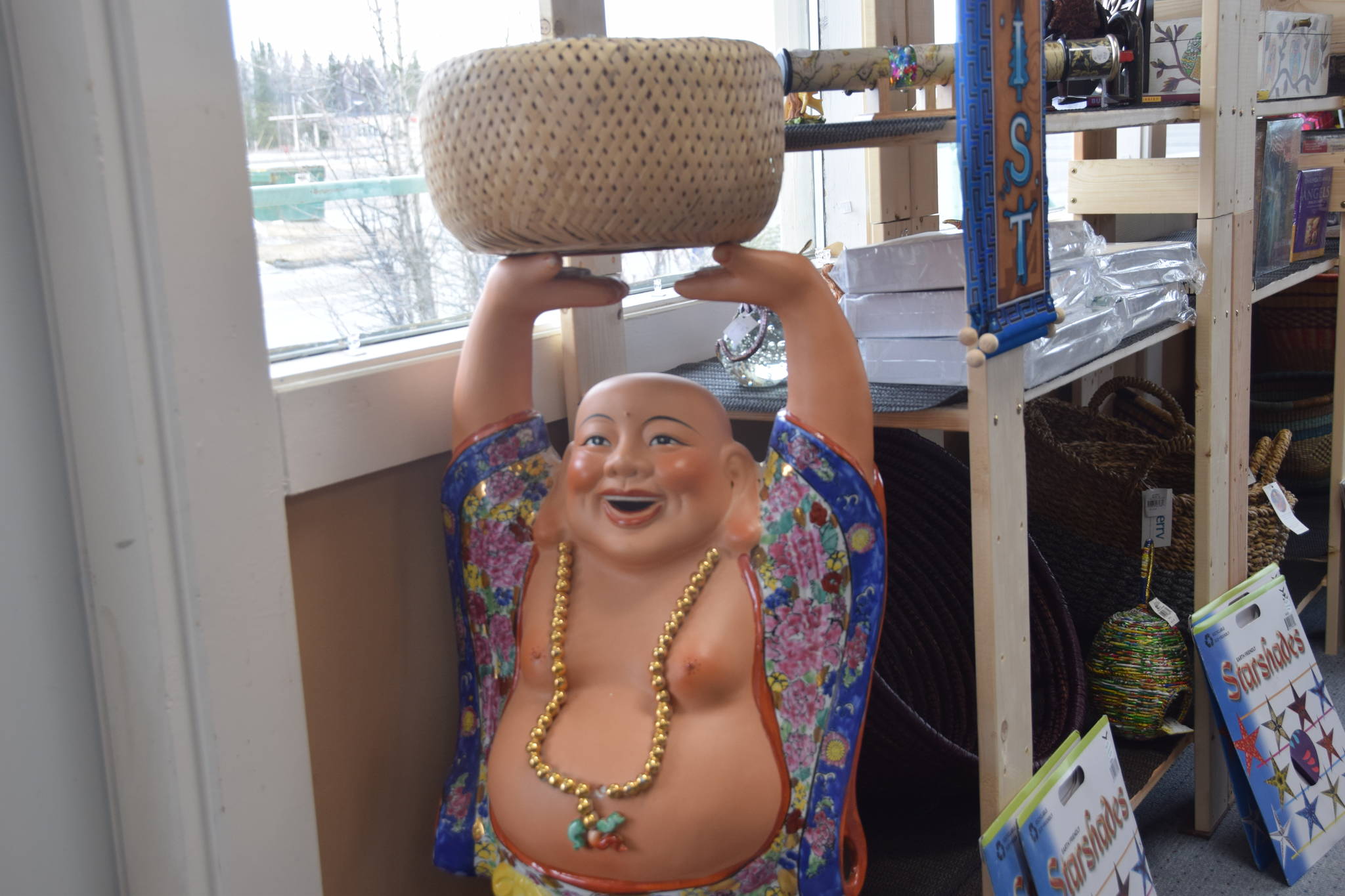 The signature Happy Buddha of Happy Buddha Imports as seen on Saturday. (Photo by Brian Mazurek/Peninsula Clarion