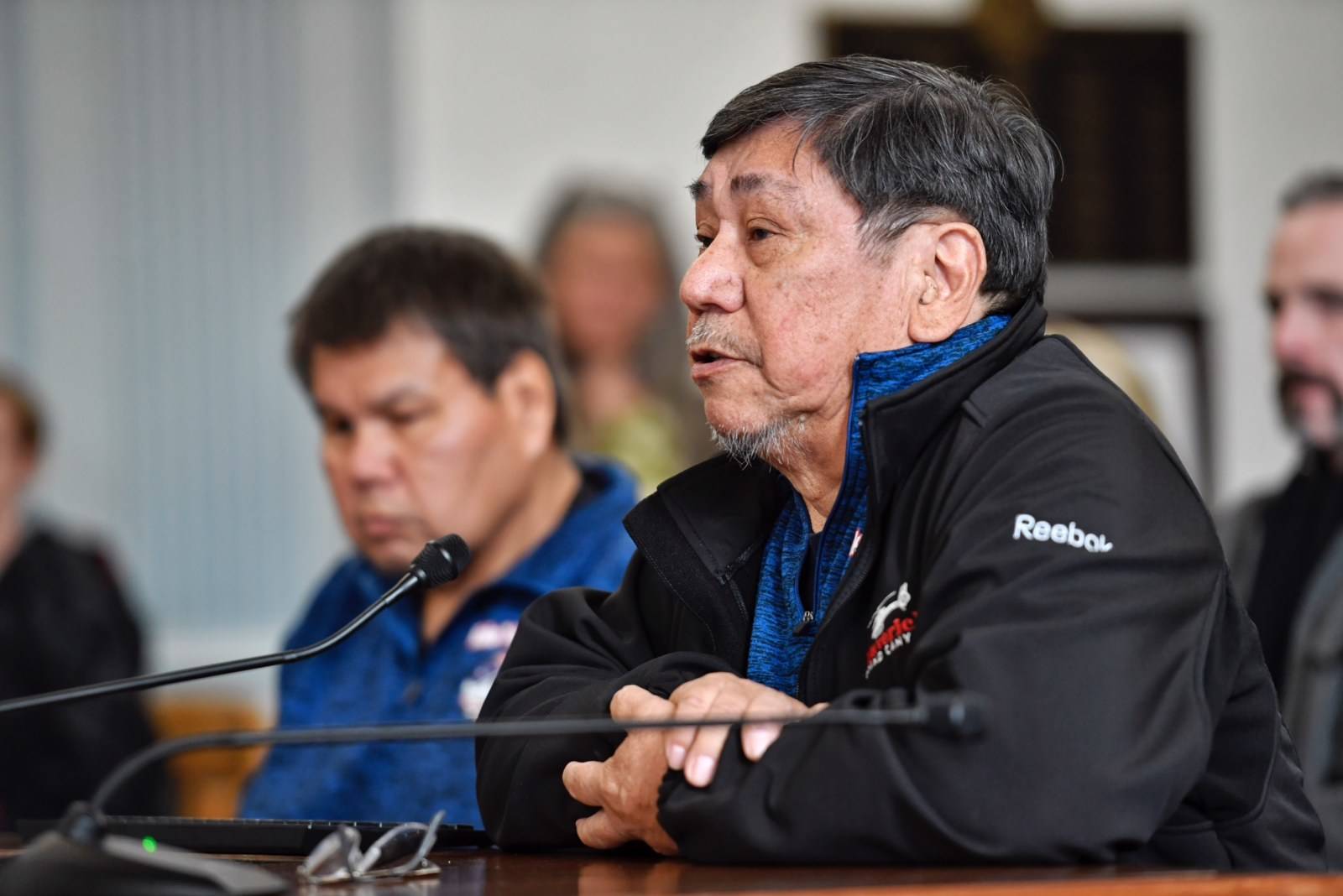 Henrich Kadake, former mayor of Kake, and his cousin Delbert Kadake, left, testify during public testimony on the state budget in the Senate Finance Committee hearing on Friday, April 12, 2019. Kadake explained how poor ferry service was hurting their community. (Michael Penn | Juneau Empire)