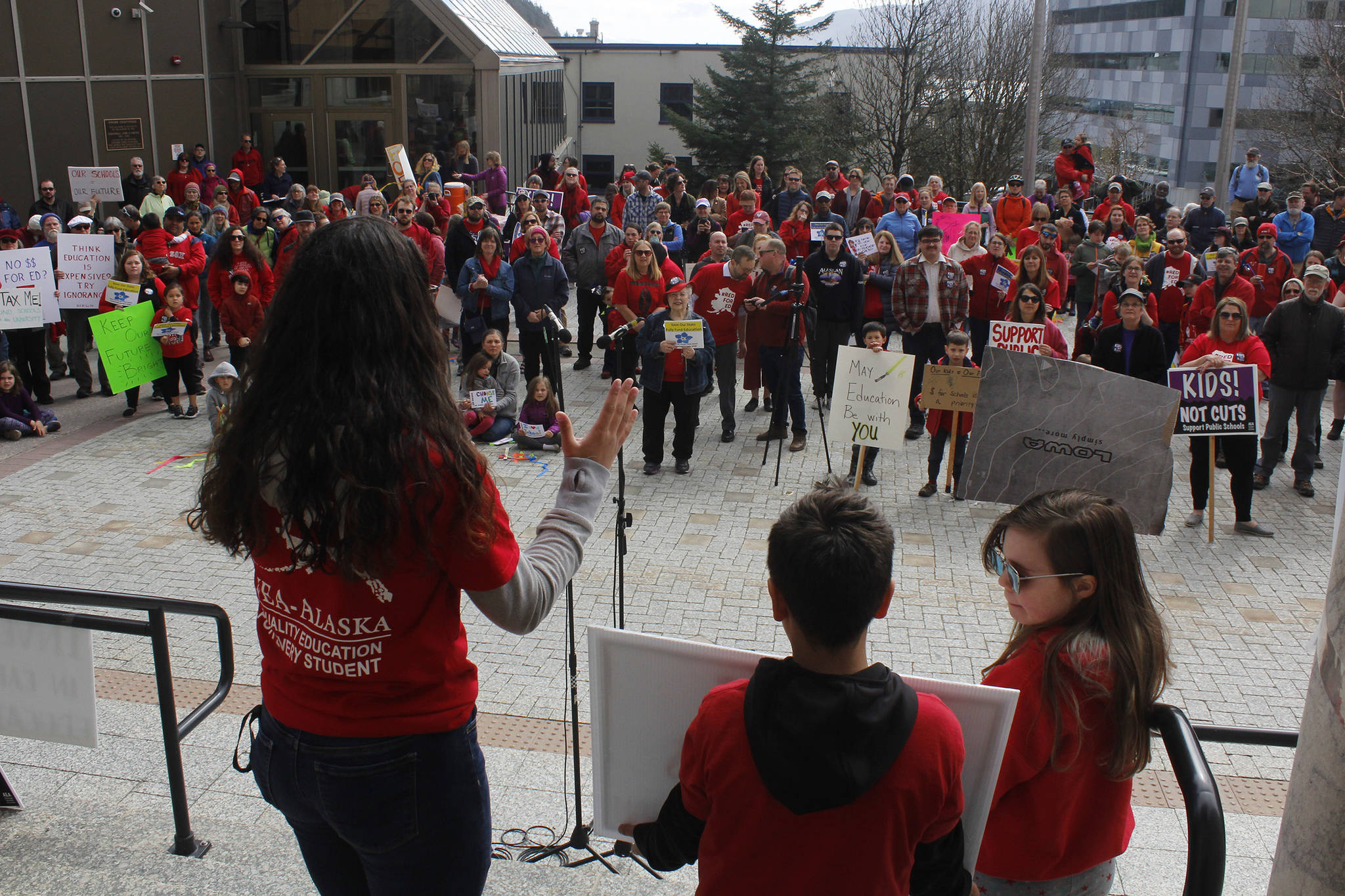 Thunder Mountain High School student Kaylani Topou speaks to a crowd at the Fund Our Future rally at the Alaska State Capitol on Saturday. (Alex McCarthy | Juneau Empire)