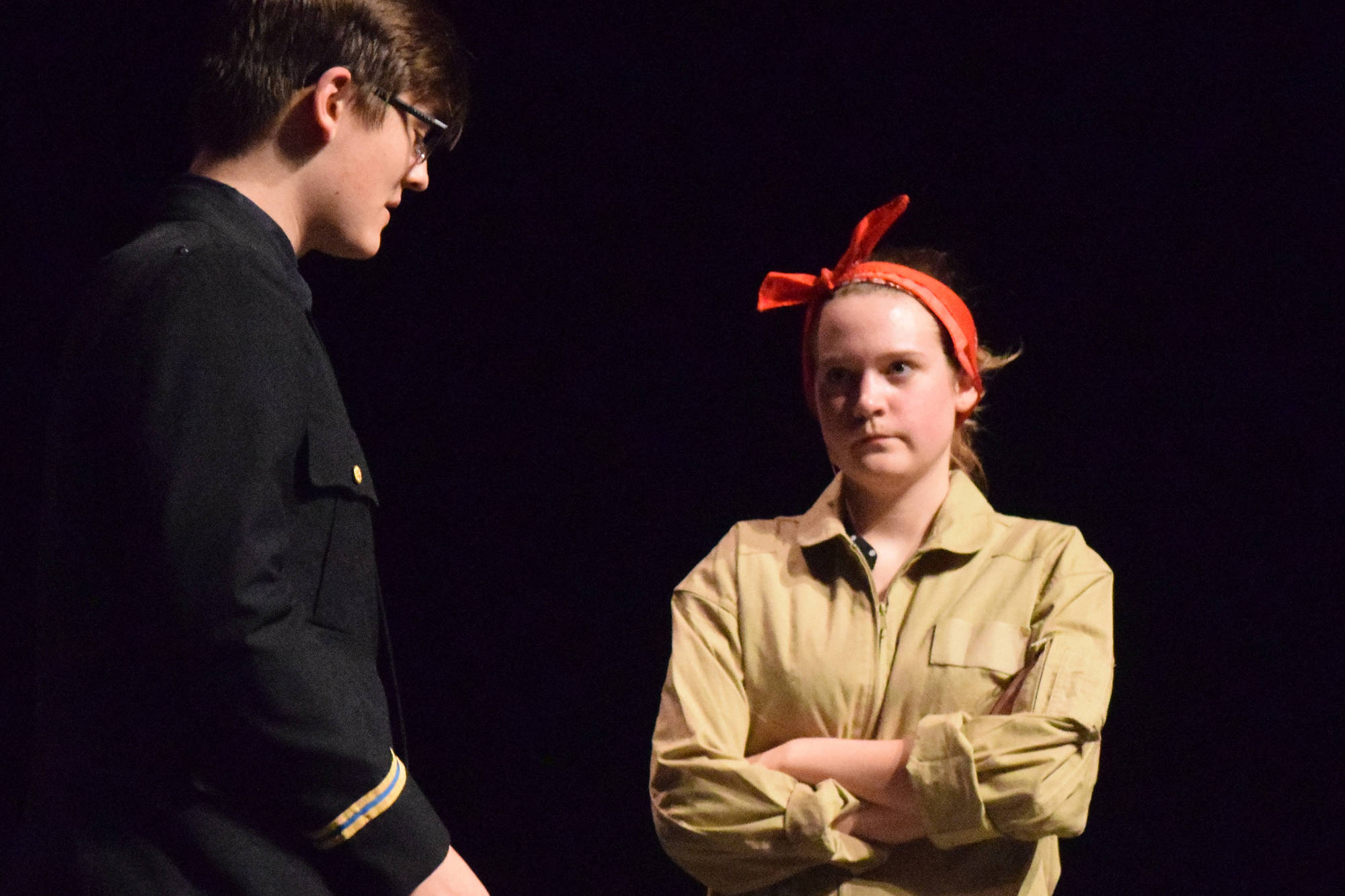 Katie Schwartz (right) trades lines with Jaron Swanson during rehearsal for “Rosie” Tuesday, April 16, 2019, at Soldotna High School in Soldotna, Alaska. (Photo by Joey Klecka/Peninsula Clarion)