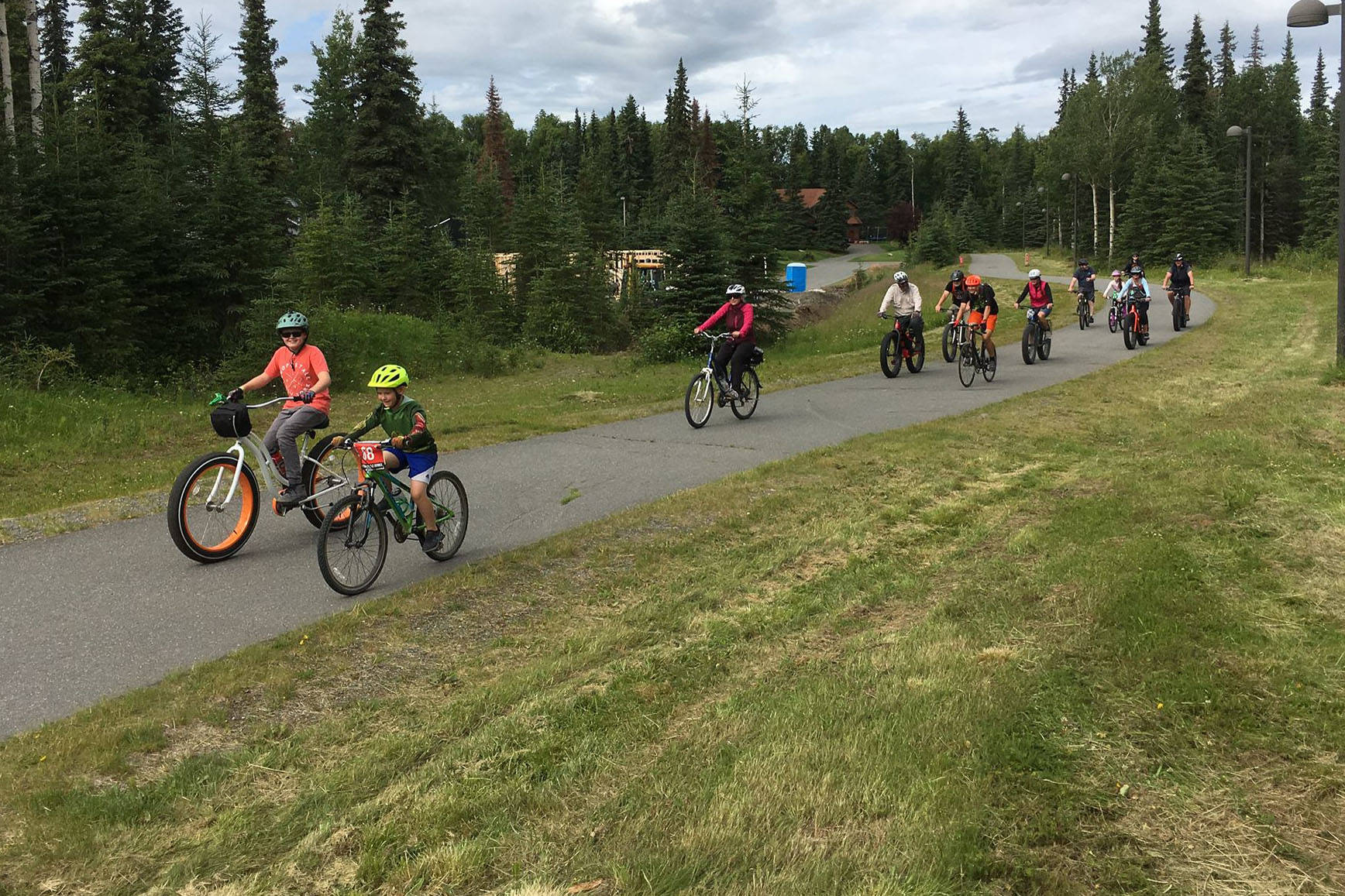 Bicyclists participate in a Full Moon Bike Ride in Soldotna, Alaska on July 27, 2018. (Photo courtesy of Jenn Tabor/BiKS)