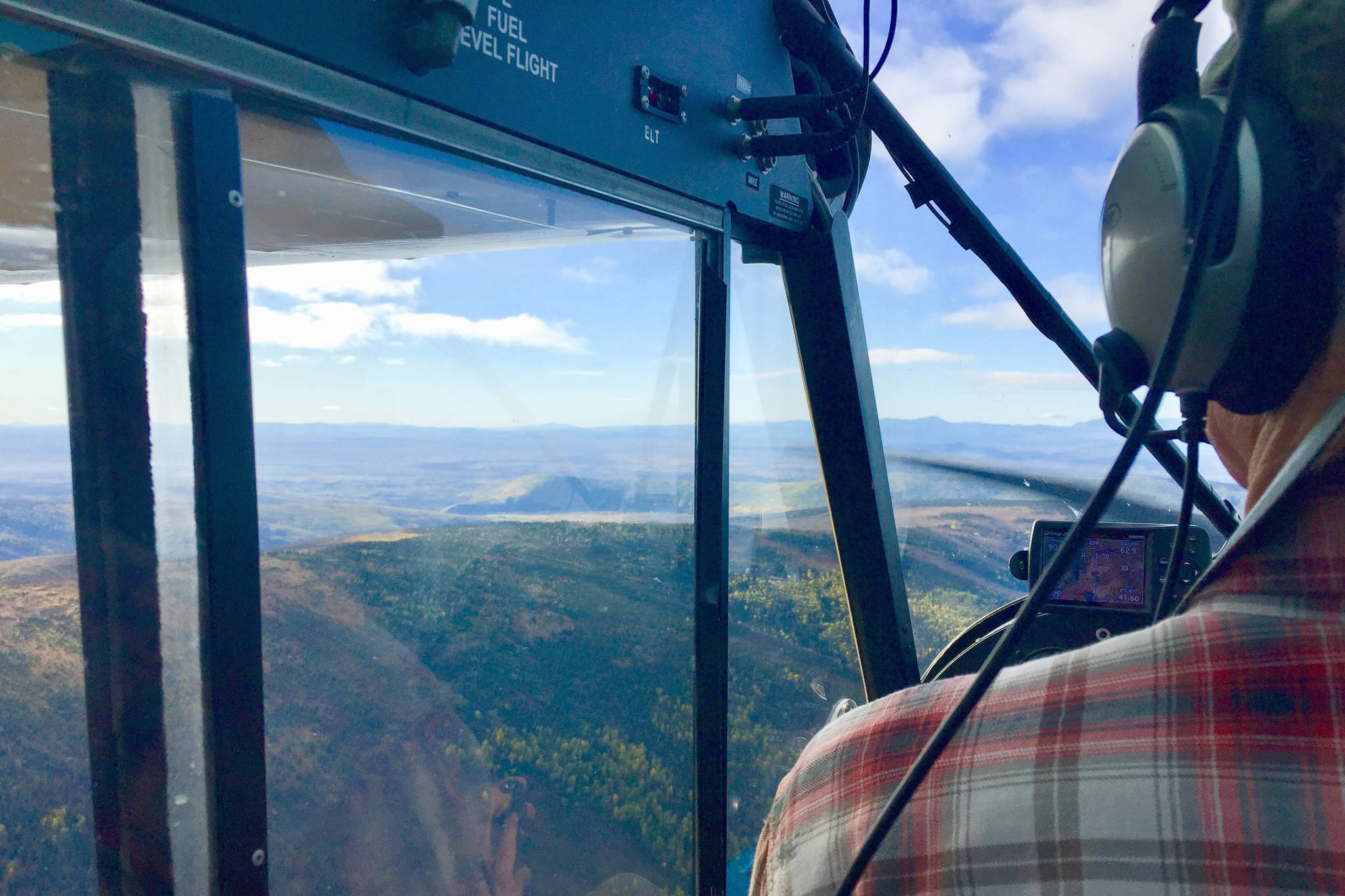 Pilot-biologist Dom Watts flying out of Fairbanks in a Super Cub. (Photo provided by Kenai National Wildlife Refuge)