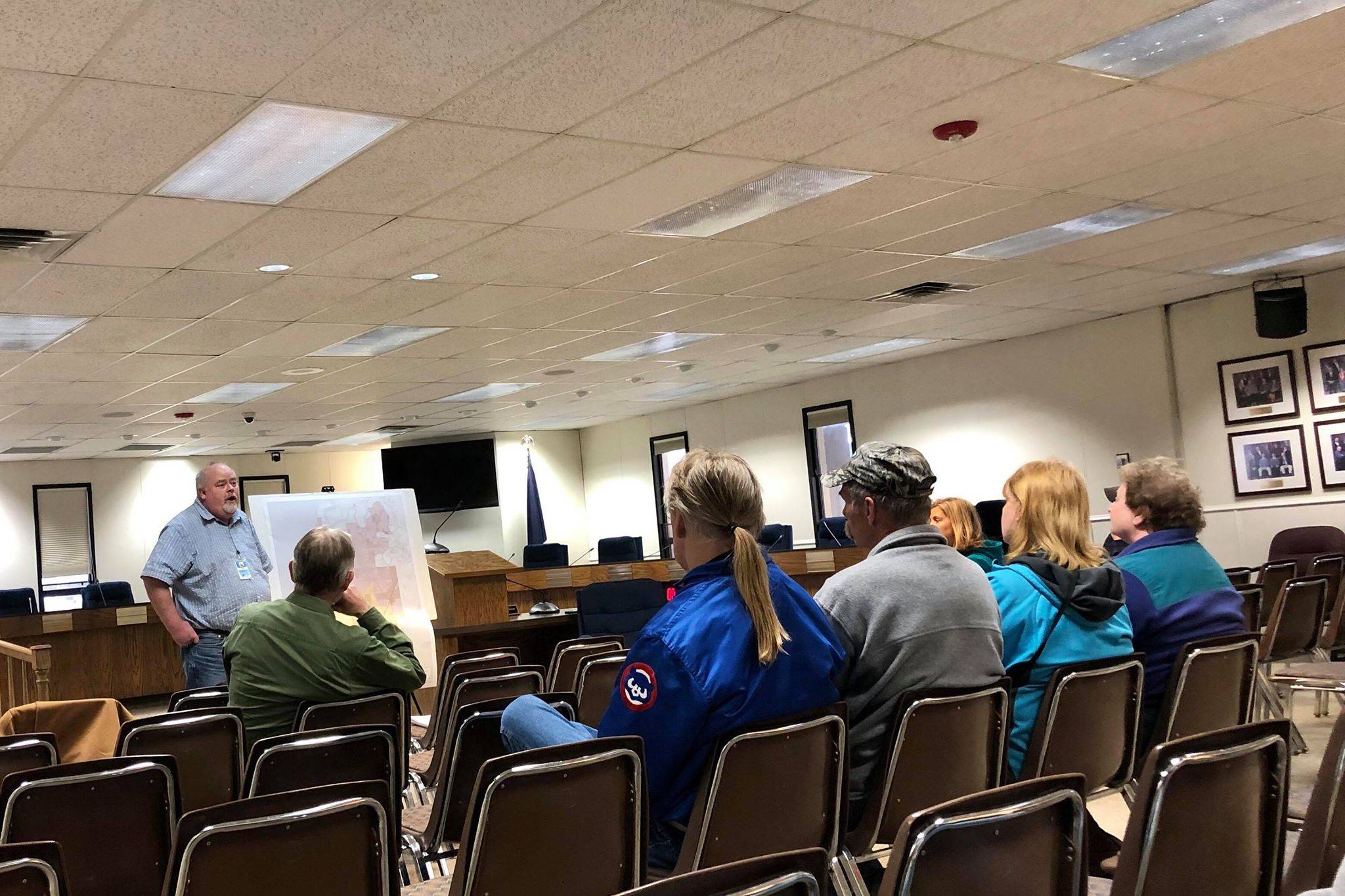 Bruce Wall, a planner with the Kenai Peninsula Borough, answers Kalifornsky residents’ questions about the creation of a new advisory planning commission for the area, on Wednesday, at the Betty J. Glick Kenai Peninsula Borough Assembly Chambers in Soldotna. (Photo by Victoria Petersen/Peninsula Clarion)