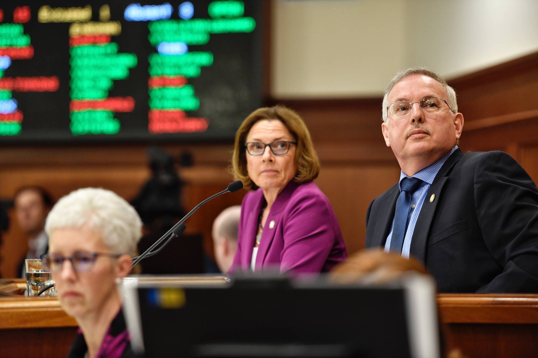 Speaker of the House Bryce Edgmon, D-Dillingham, and Senate President Cathy Giessel, R-Anchorage, watch the votes tally for Amanda Price for commissioner of the Department of Public Safety during confirmation voting during a joint session of the Alaska Legislature at the Capitol on Wednesday, April 17, 2019. (Michael Penn | Juneau Empire)