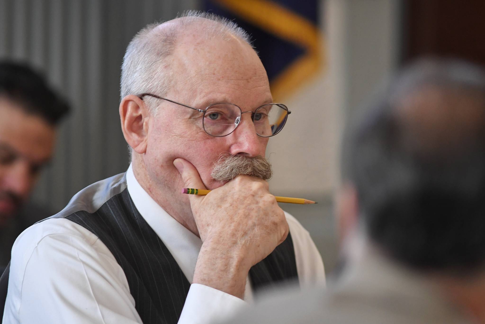 Sen. Bert Stedman, R-Sitka, listens to Finance Division Director David Teal answers questions from the Senate Finance Committee on the state’s budget at the Capitol on Thursday, April 25, 2019. (Michael Penn | Juneau Empire)