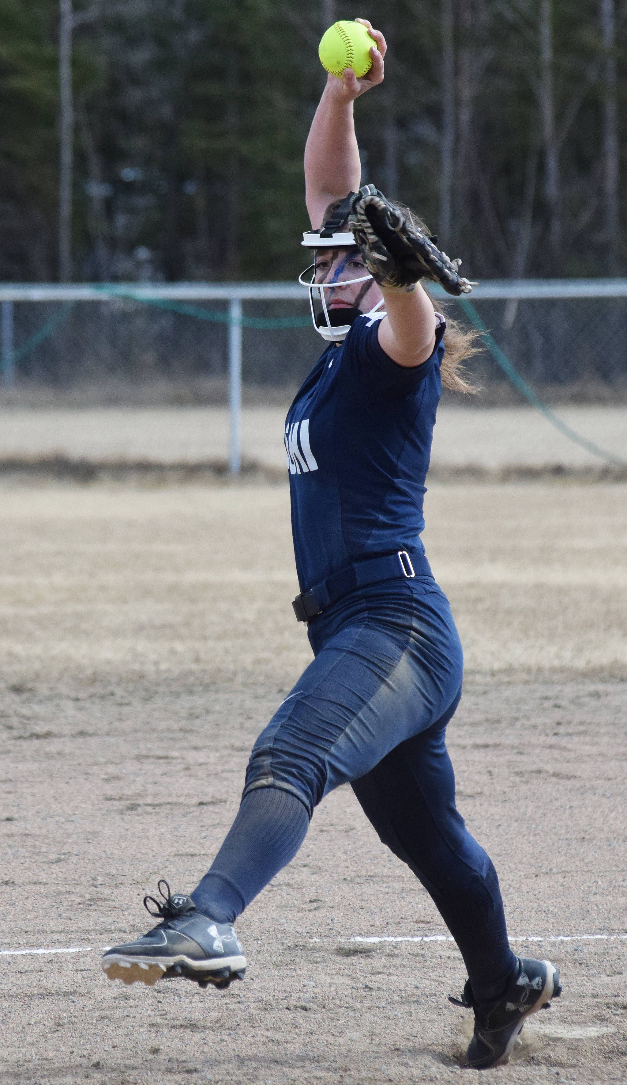 Soldotna’s Casey Earll offers up a pitch to a Kenai Central batter Thursday, April 25, 2019, at the Soldotna Softball Fields. (Photo by Joey Klecka/Peninsula Clarion)