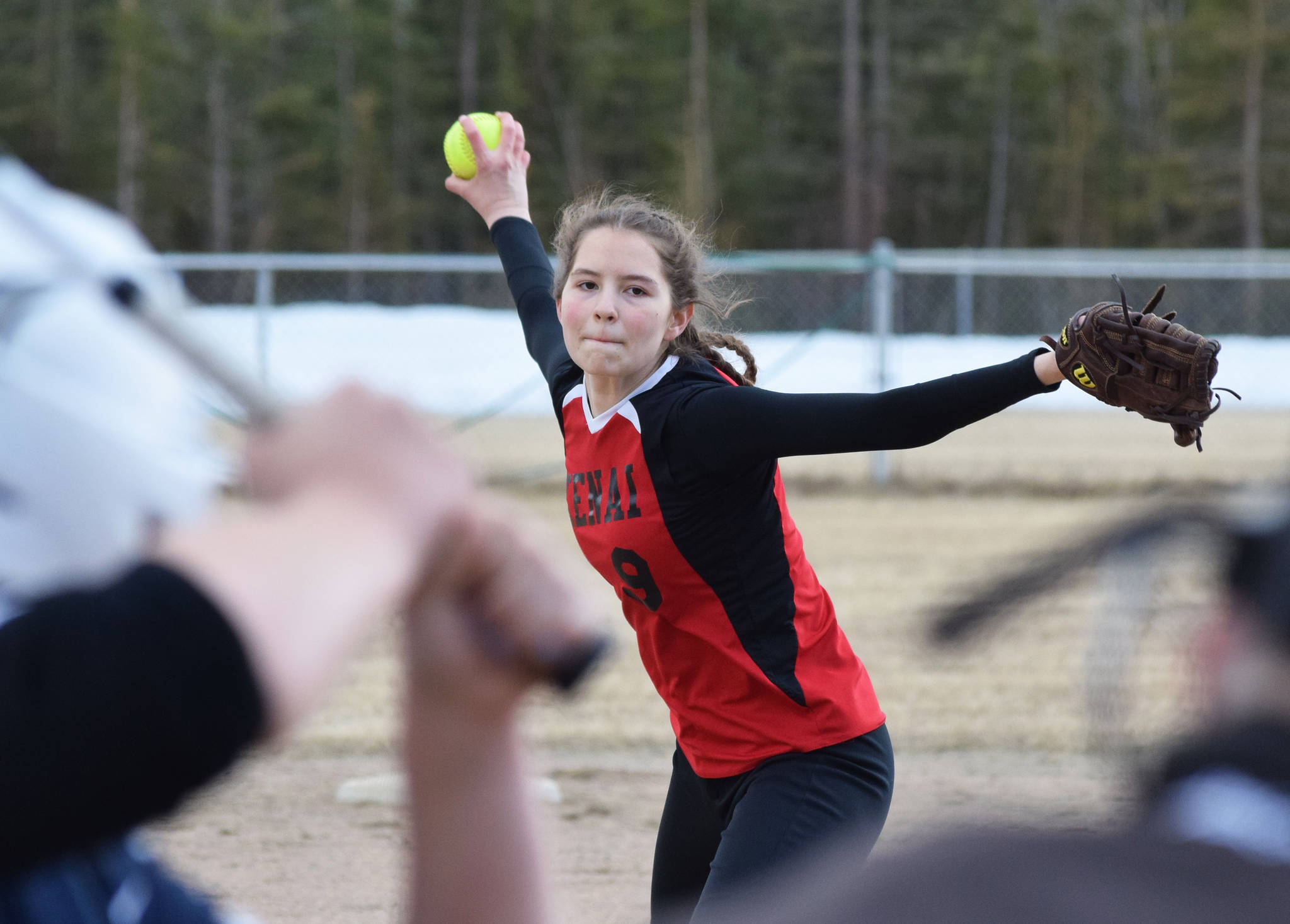 Kenai Central’s Lexi Reis unleashes a pitch on a Soldotna batter Thursday, April 25, 2019, at the Soldotna Softball Fields. (Photo by Joey Klecka/Peninsula Clarion)