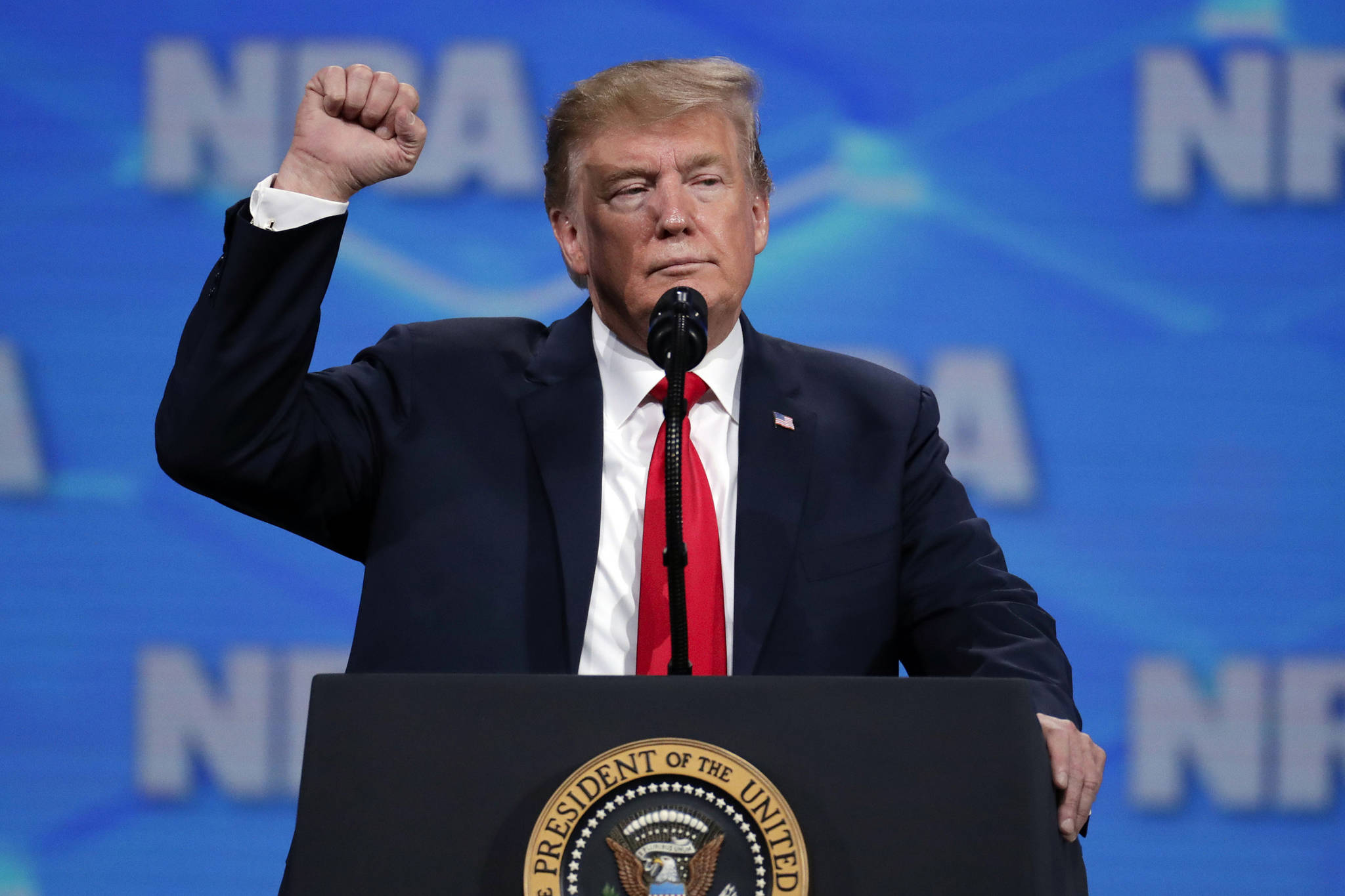 President Donald Trump speaks at the National Rifle Association Institute for Legislative Action Leadership Forum in Lucas Oil Stadium in Indianapolis on Friday, April 26, 2019. (Michael Conroy | Associated Press)