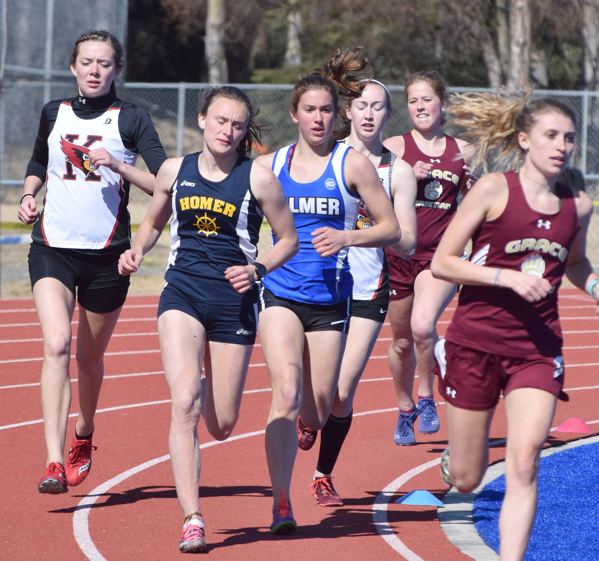(From L to R) Kenai Central senior Brooke Satathite, Homer junior Autumn Daigle, Palmer sophomore Sophie Wright and Kenai senior Jaycie Calvert race in the girls 1,600 meters Saturday afternoon at the SoHi Region III Preview Invite at Justin Maile Field in Soldotna. (Photo by Joey Klecka/Peninsula Clarion)
