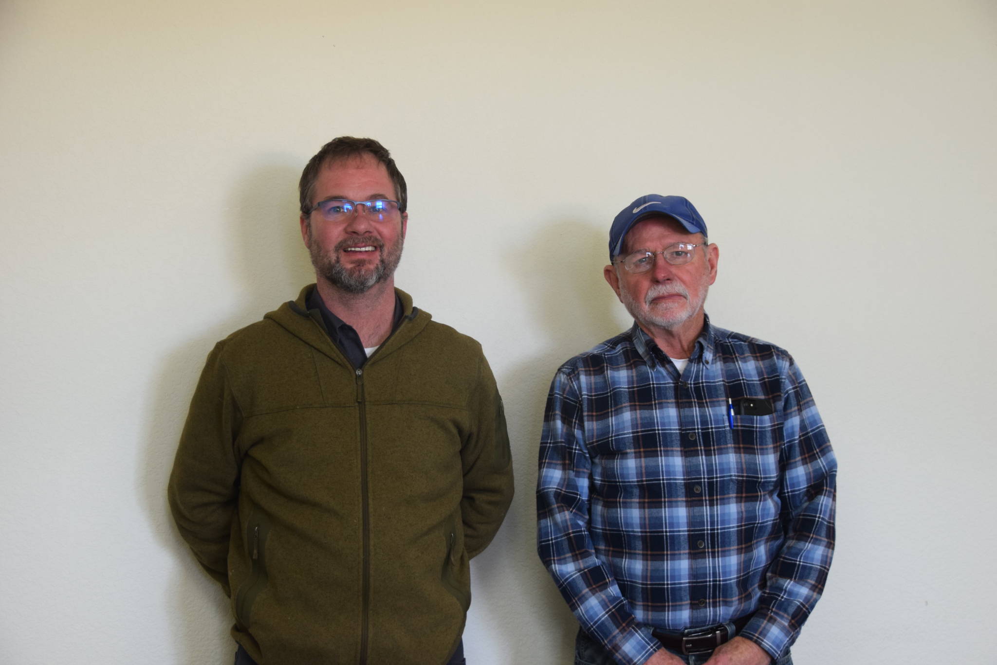 Alyeska Tire Manager Craig Wortham, left, and owner Jerry Wortham, right, pose for a photo in Soldotna, Alaska on April 26, 2019. (Photo by Brian Mazurek/Peninsula Clarion)