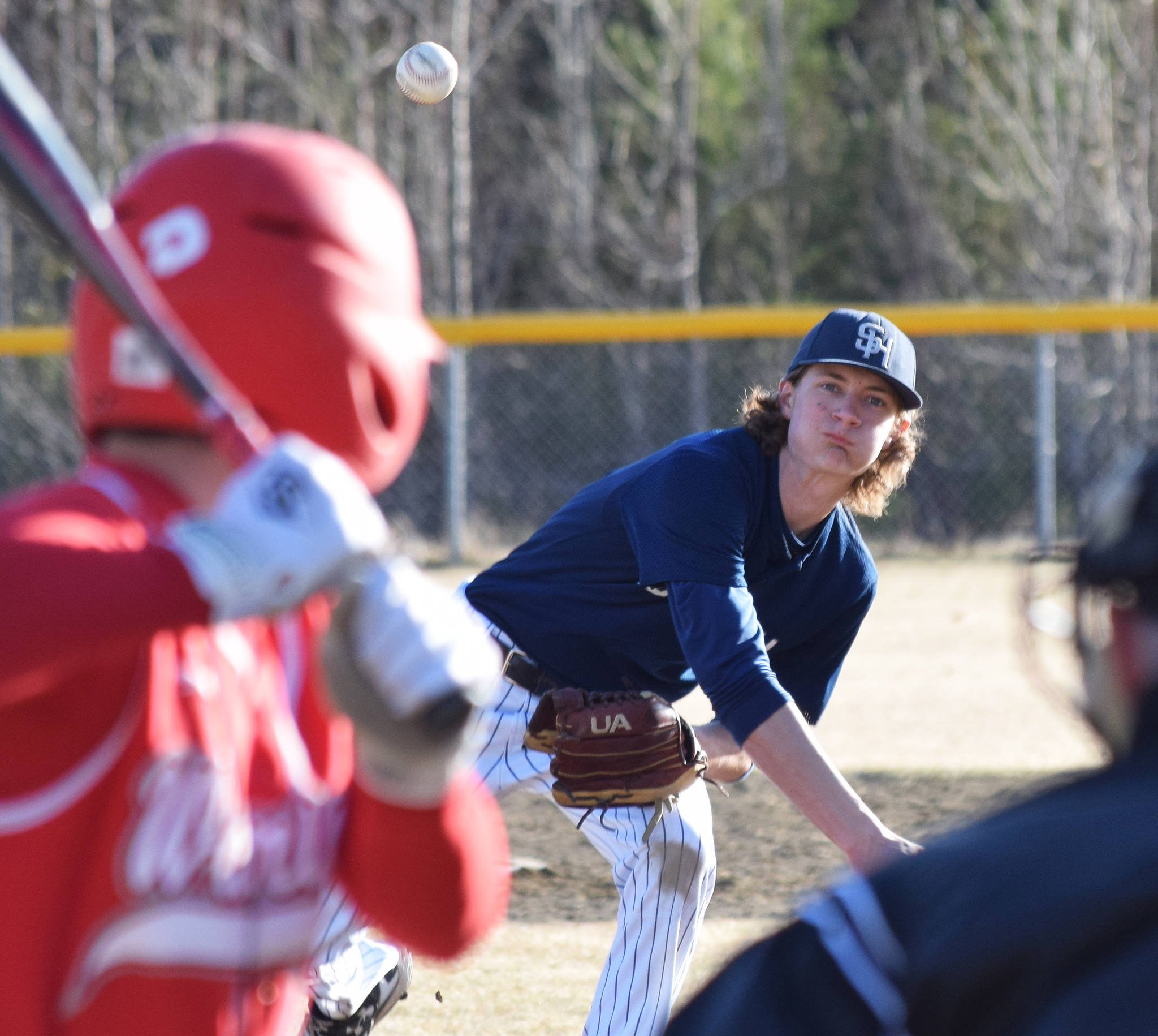 Soldotna’s Davey Belger offers up a pitch to a Wasilla batter in a Southcentral Conference contest Thursday, May 2, 2019, at the Soldotna Baseball Fields. (Photo by Joey Klecka/Peninsula Clarion)