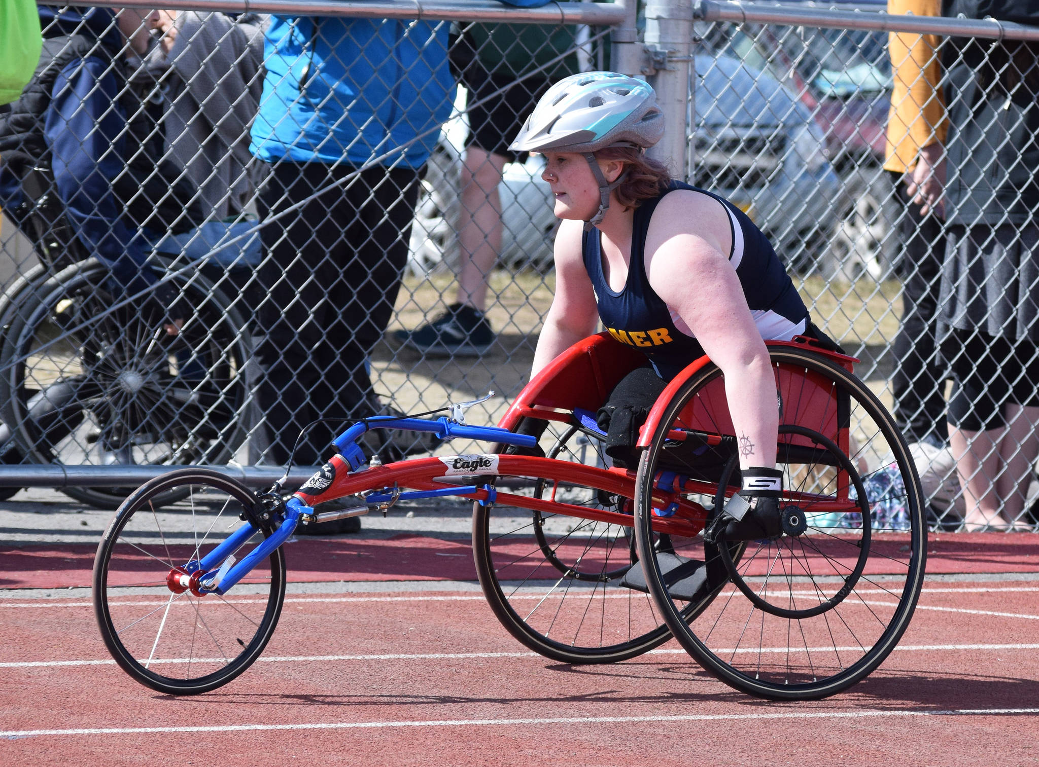Homer’s Angelica Haakenson competes in the girls 400 meters Saturday, May 4, 2019, at the Kenai Invitational track meet at Kenai Central High School. Haakenson lost her legs in a Dec. 2014 car crash. (Photo by Joey Klecka/Peninsula Clarion)