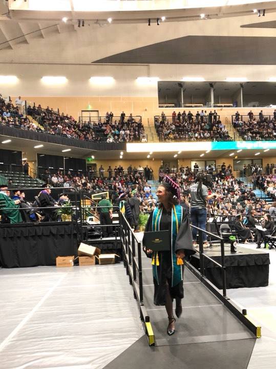 School of Education graduate Jennifer Hoeldt walks across the stage at the University of Alaska Anchorage spring commencement ceremony, on Sunday, May 5, 2019, in Anchorage, Alaska. (Photo by Victoria Petersen/Peninsula Clarion)