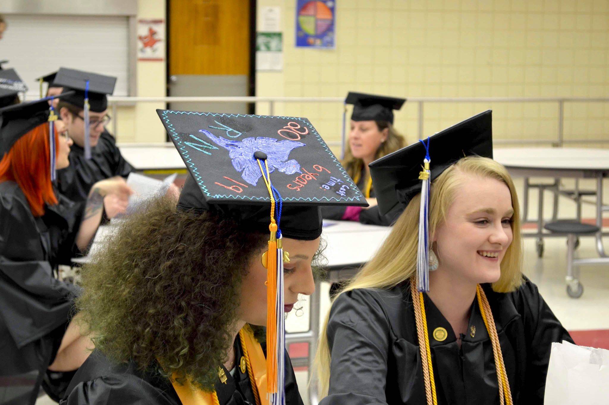 A group of nursing graduates from Kenai Peninsula College’s Kenai River Campus get ready to walk the stage and receive their degrees on Thursday, May 9, 2019, at Kenai Central High School in Kenai, Alaska. (Photo by Victoria Petersen/Peninsula Clarion)