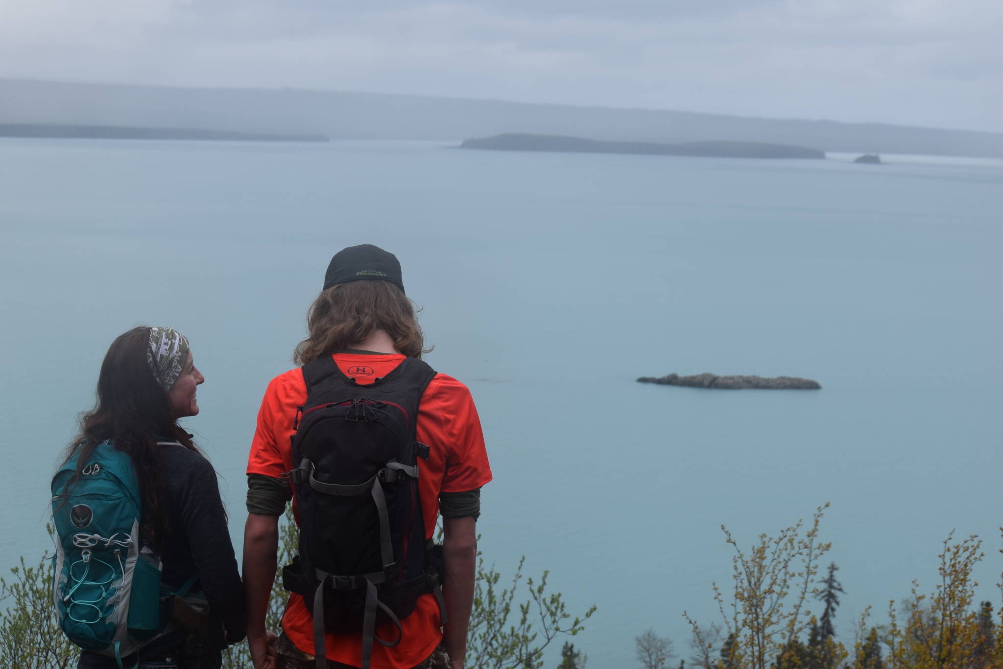Tiffany Brand and her son look out over Skilak Lake while hiking the Vista Trail in Alaska on Saturday, May 11, 2019. (Photo by Brian Mazurek/Peninsula Clarion)