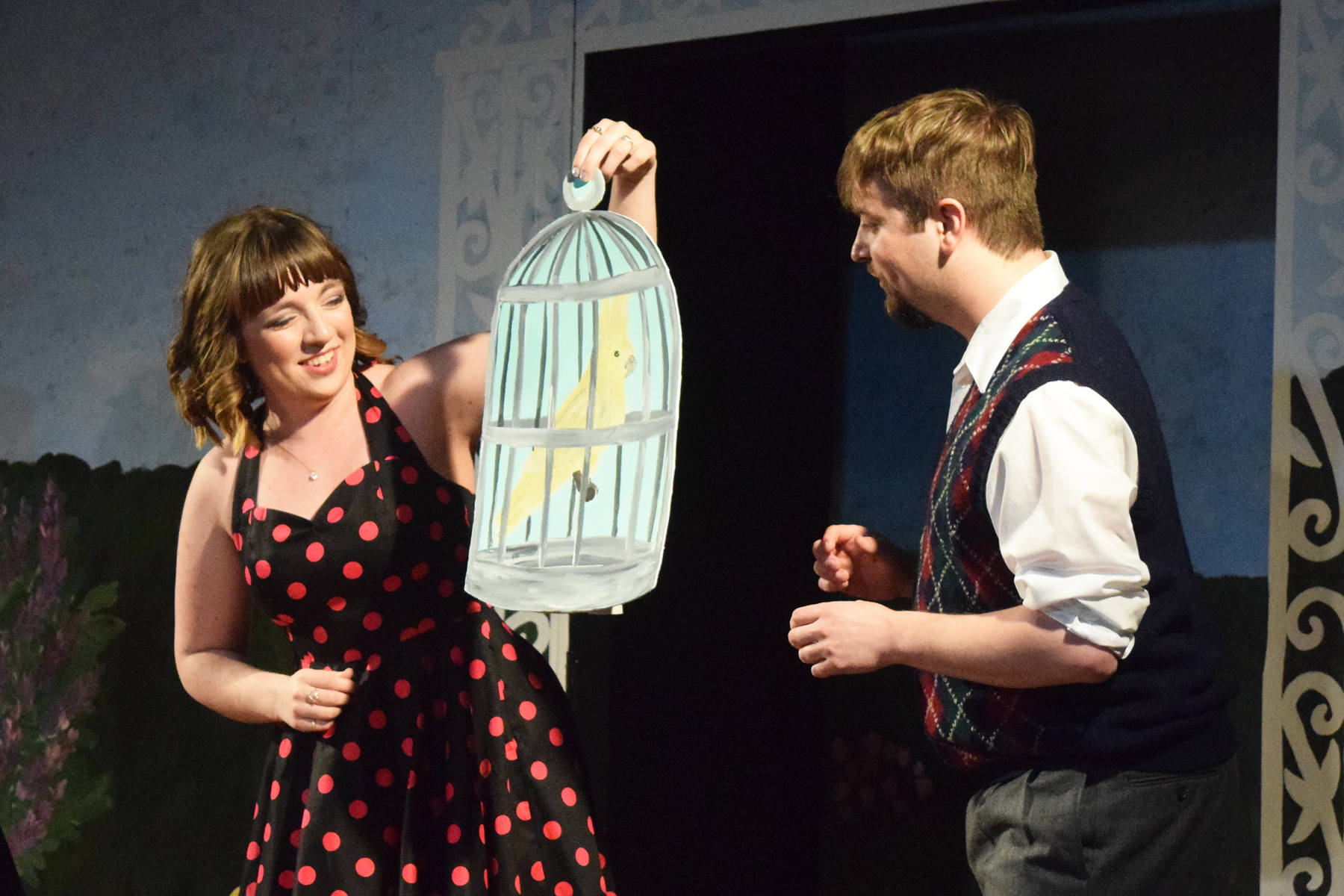 Hannah Tauriainen (left) acts out a scene with Aaron Gordon during rehearsal of Sabrina Fair, Tuesday, May 14, 2019, at Triumvirate North Theater in Kenai, Alaska. (Photo by Joey Klecka/Peninsula Clarion)