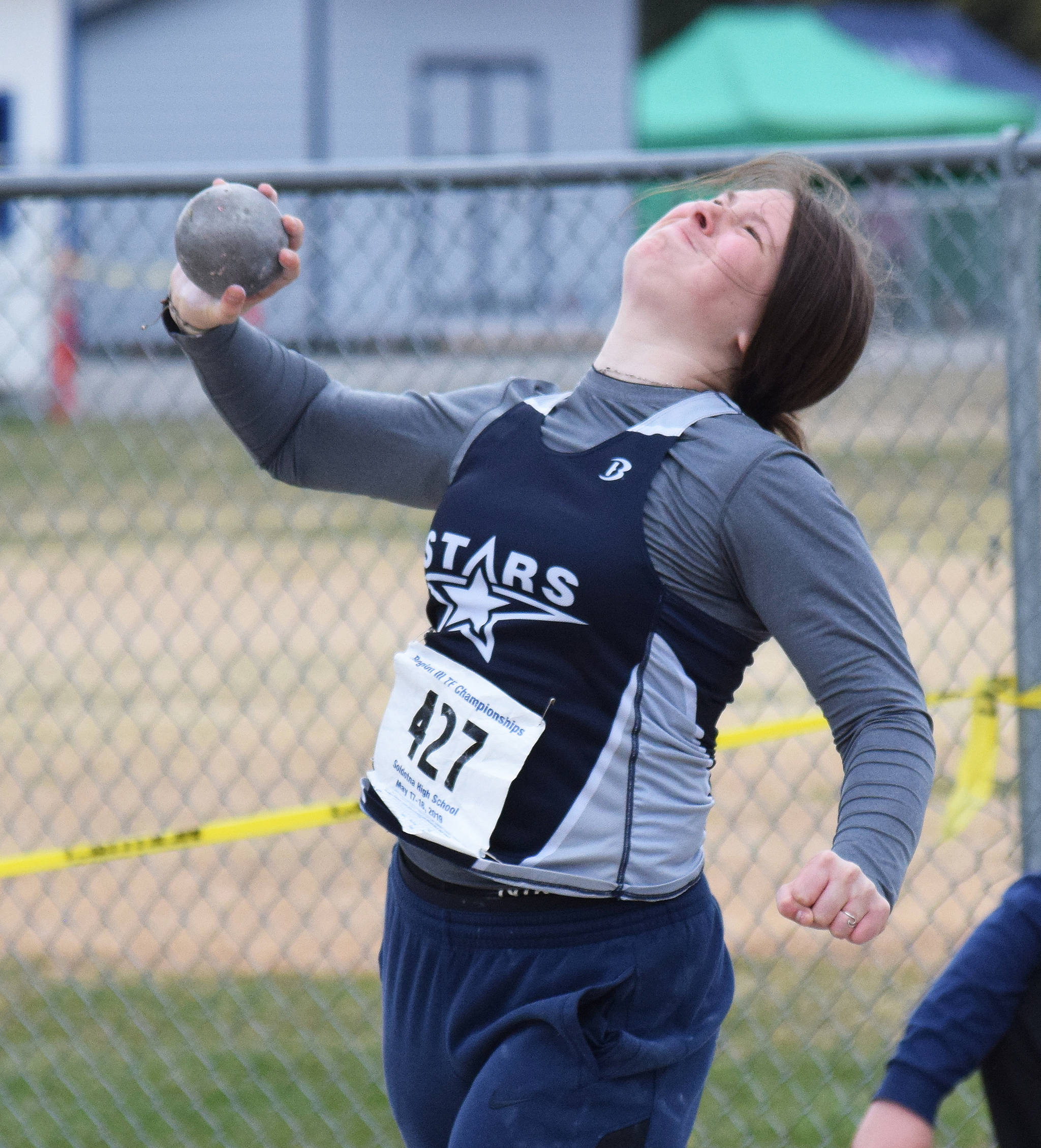 Soldotna’s Autumn Fisher unleashes a shot put throw Saturday, May 18, 2019, at the Region III Track and Field Championships in Soldotna, Alaska. (Photo by Joey Klecka/Peninsula Clarion)