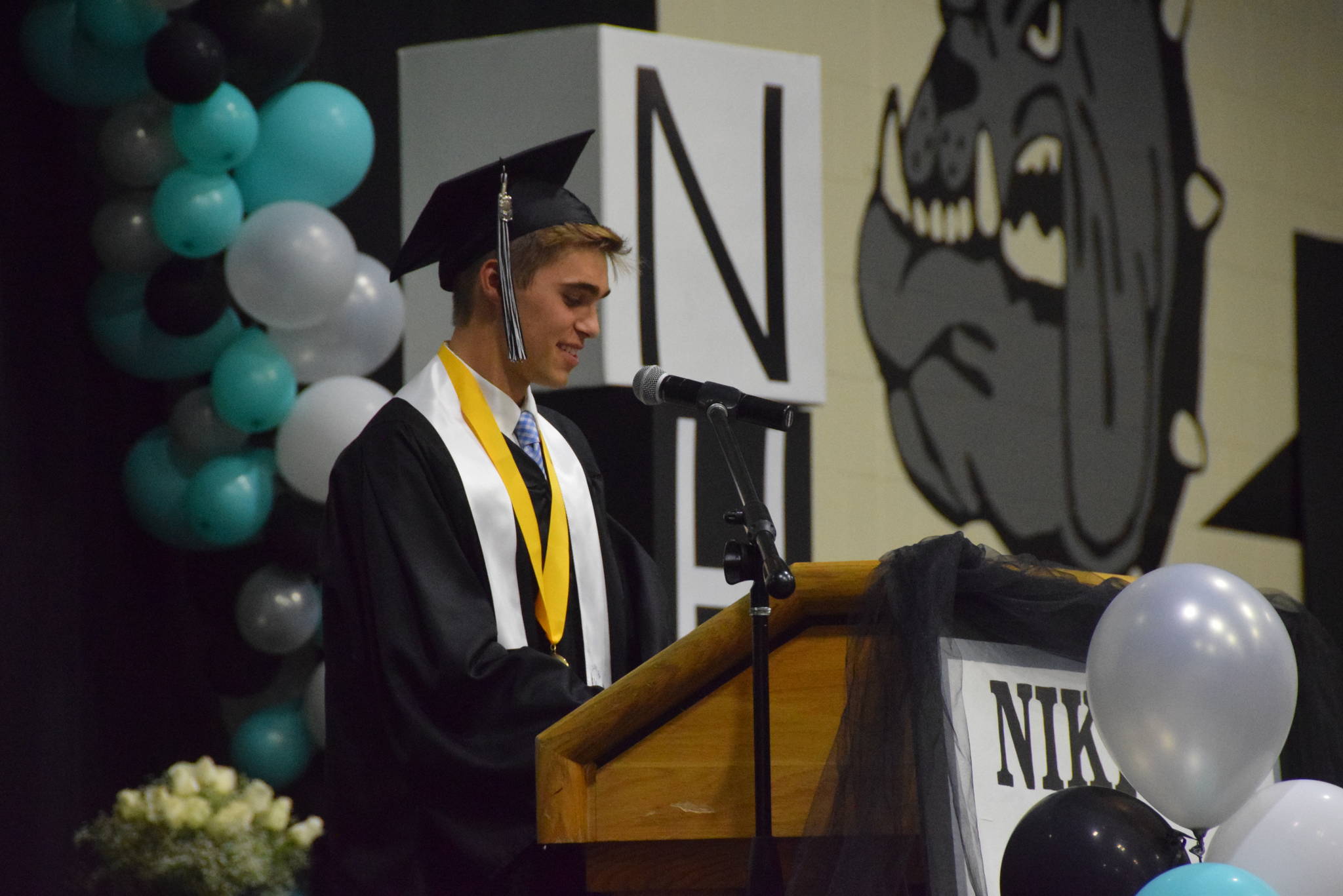 Valedictorian Garrett Ellis gives his speech during the 2019 Nikiski High School graduation in Nikiski, Alaska on May 20, 2019. (Photo by Brian Mazurek/Peninsula Clarion)