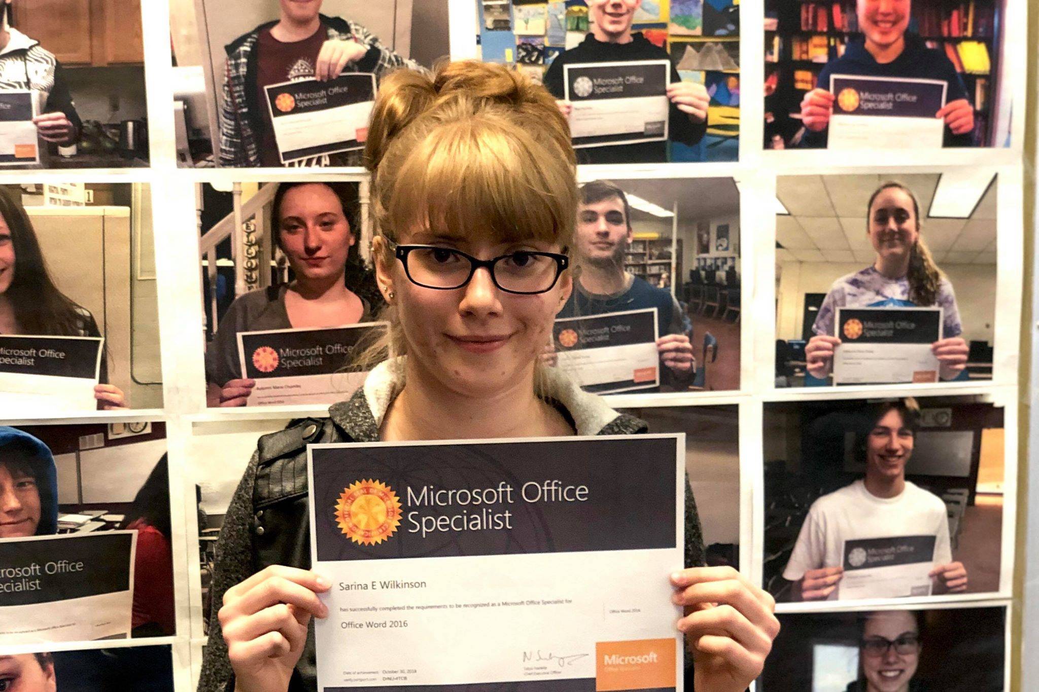 Sarina Wilkinson stands with her current Microsoft Specialist certifications, Wilkinson is currently working toward her last one on Tuesday, May 21, 2019, at Soldotna Prep School in Soldotna, Alaska.