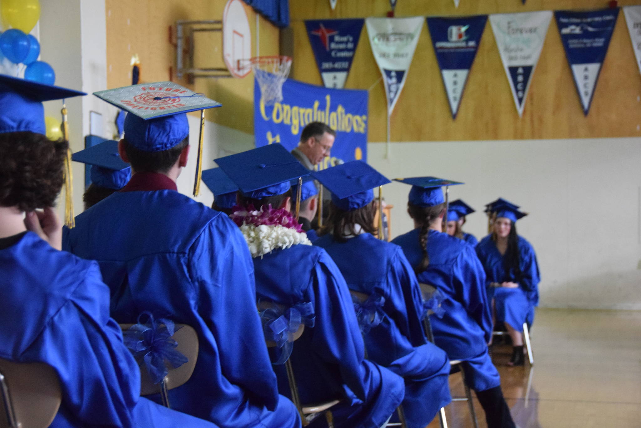 The class of 2019 sits in anticipation during the Kenai Alternative High School 2019 graduation in Kenai, Alaska on May 22, 2019. (Photo by Brian Mazurek/Peninsula Clarion)