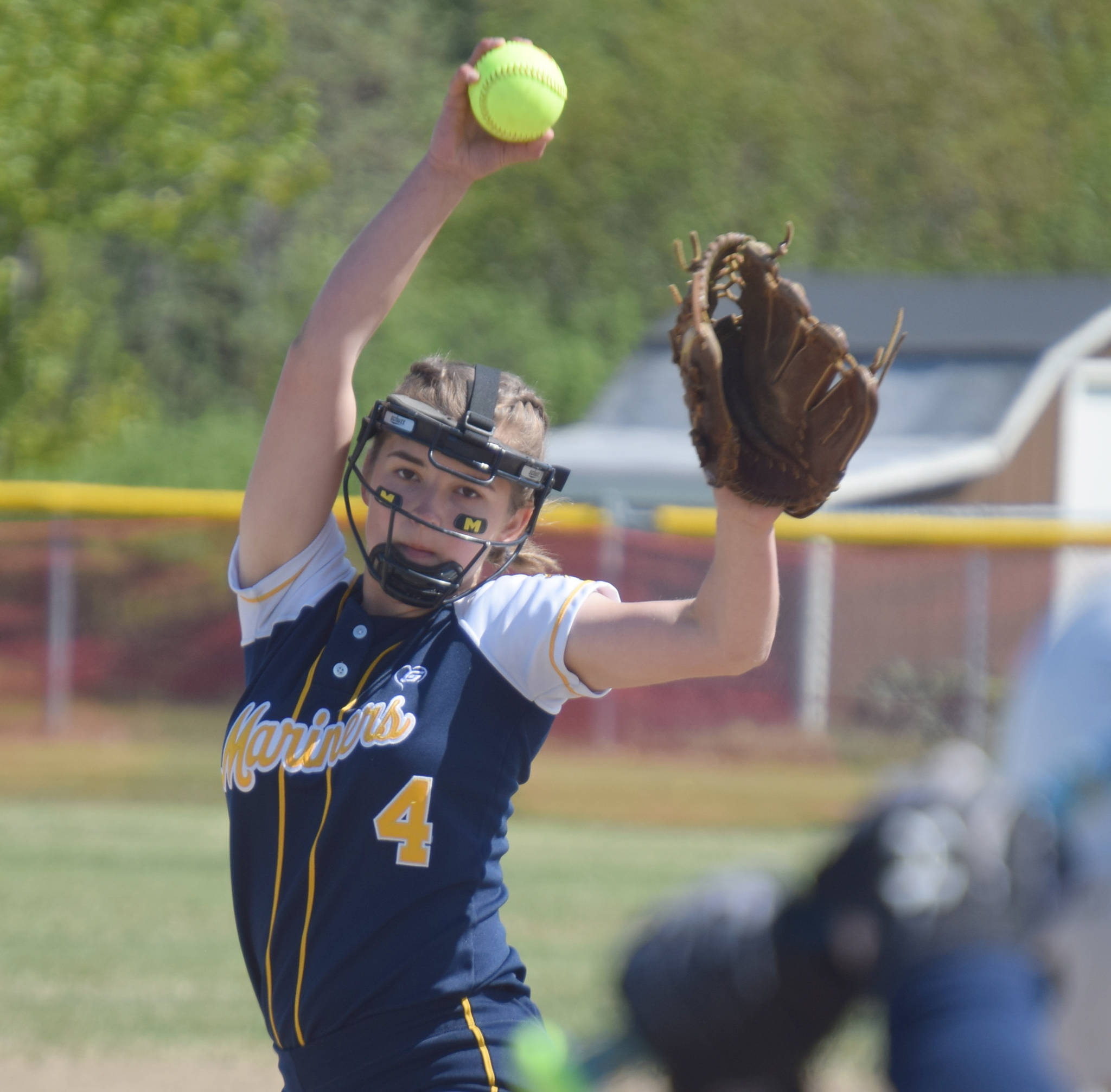 Homer pitcher Annalynn Brown delievers to Soldotna on Friday, May 24, 2019, at the Northern Lights Conference softball tournament at Steve Shearer Memorial Ball Park in Kenai, Alaska. (Photo by Jeff Helminiak/Peninsula Clarion)