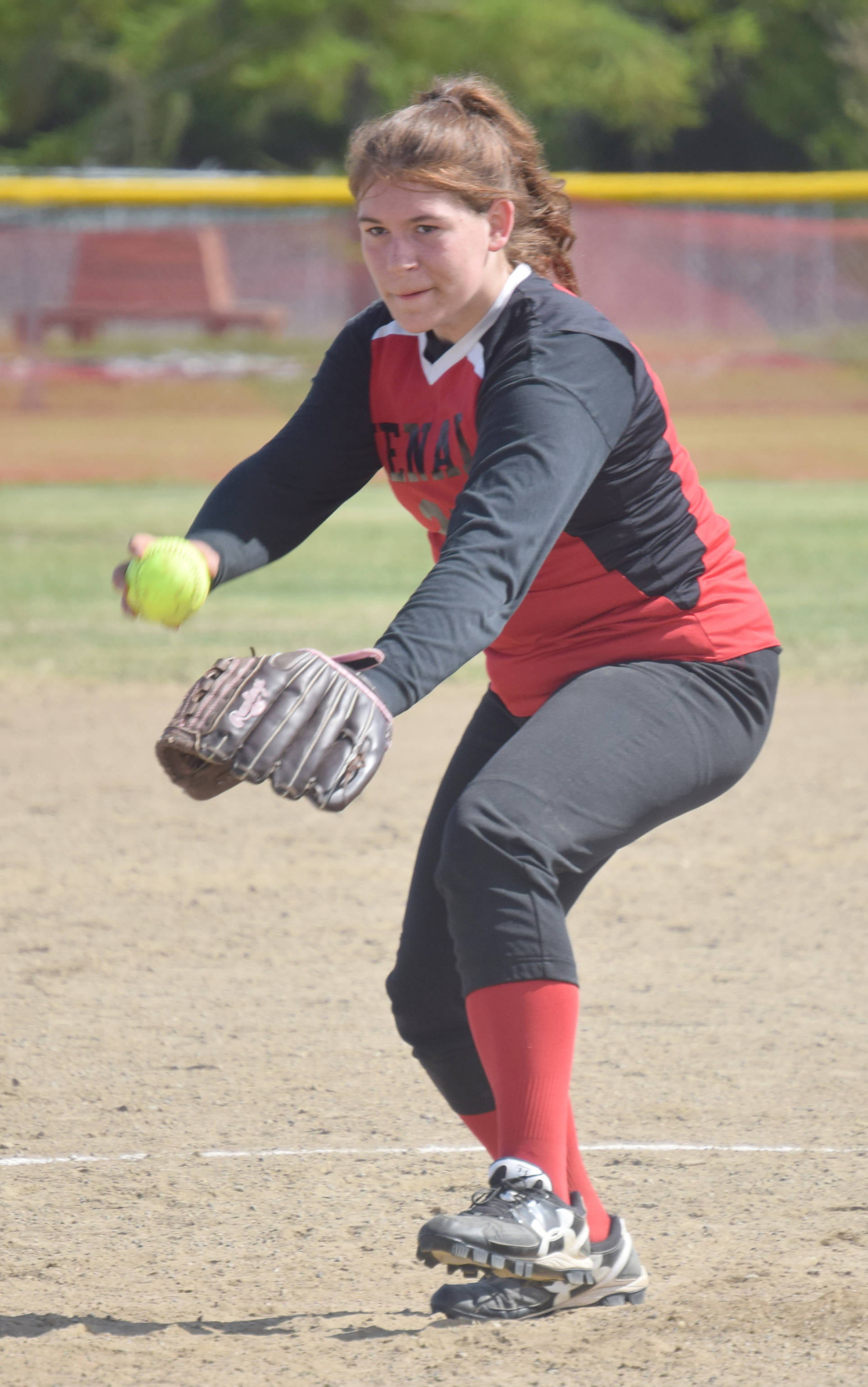 Kenai Central pitcher Kaylee Lauritsen delivers to Houston on Friday, May 24, 2019, in the Northern Lights Conference softball tournament at Steve Shearer Memorial Ball Park in Kenai, Alaska. (Photo by Jeff Helminiak/Peninsula Clarion)