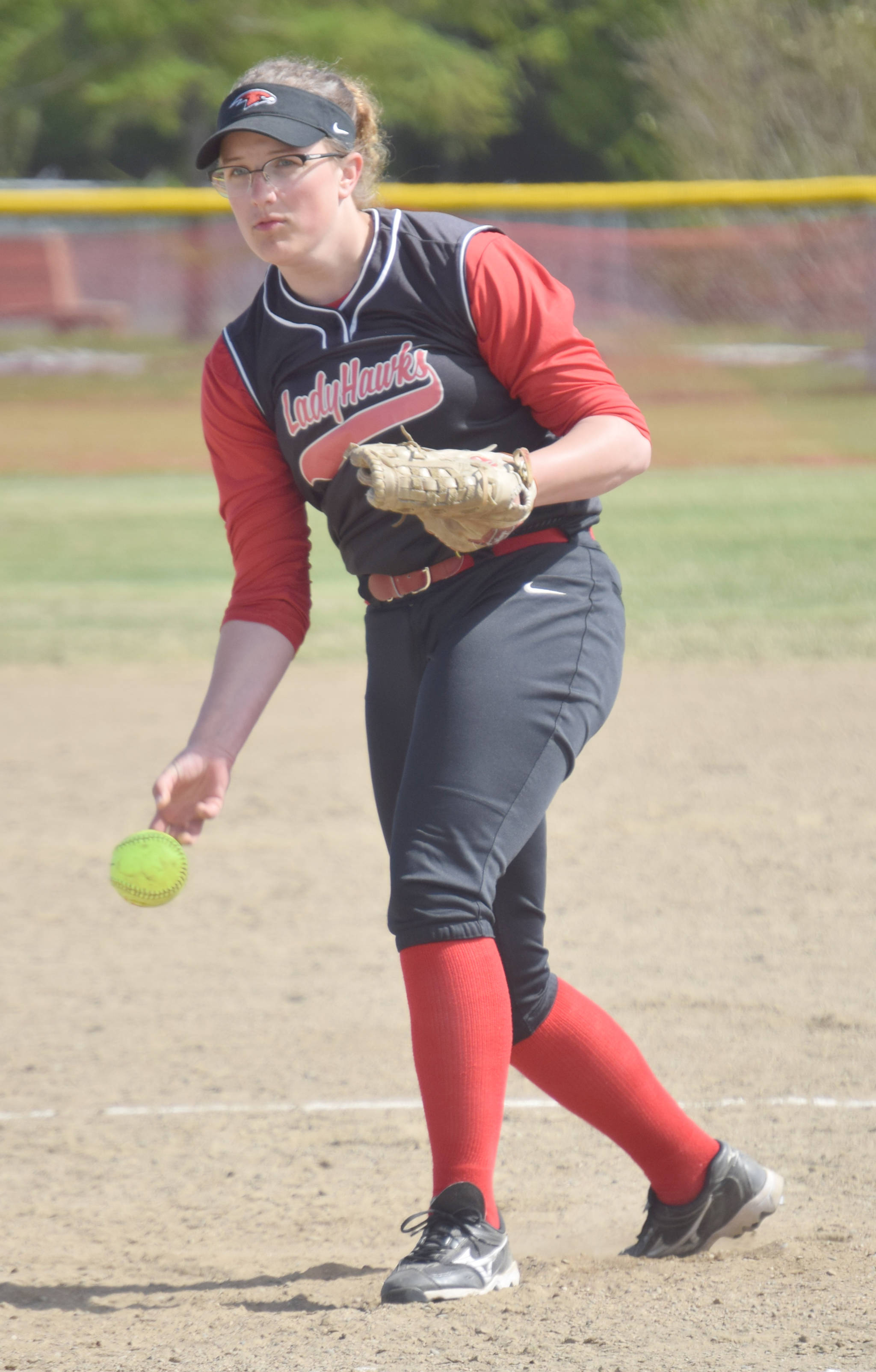 Houston pitcher Cambrie Schultz delivers to Kenai Central on Friday, May 24, 2019, during the Northern Lights Conference softball tournament at Steve Shearer Memorial Ball Park in Kenai, Alaska. (Photo by Jeff Helminiak/Peninsula Clarion)