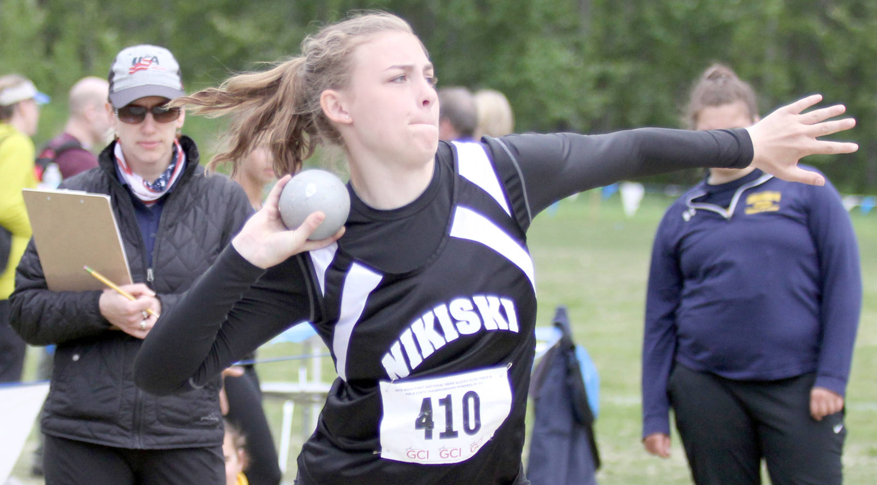 Nikiski senior Bethany Carstens makes her final throw during the Division II girls’ shot put event of the ASAA/First National Bank State Track and Field Championships Friday, May 24, 2019, at Palmer High School.