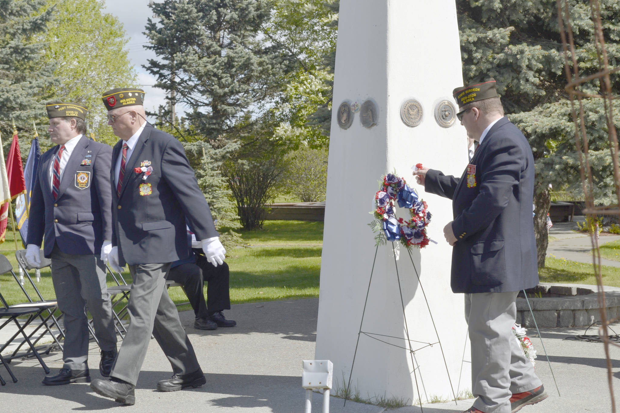 Families were invited to place flowers and wreaths in remembrance of fallen service members at Kenai’s Memorial Day ceremony on Monday, May 27, 2019, at Leif Hansen Memorial Park in Kenai, Alaska. (Photo by Victoria Petersen/Peninsula Clarion)