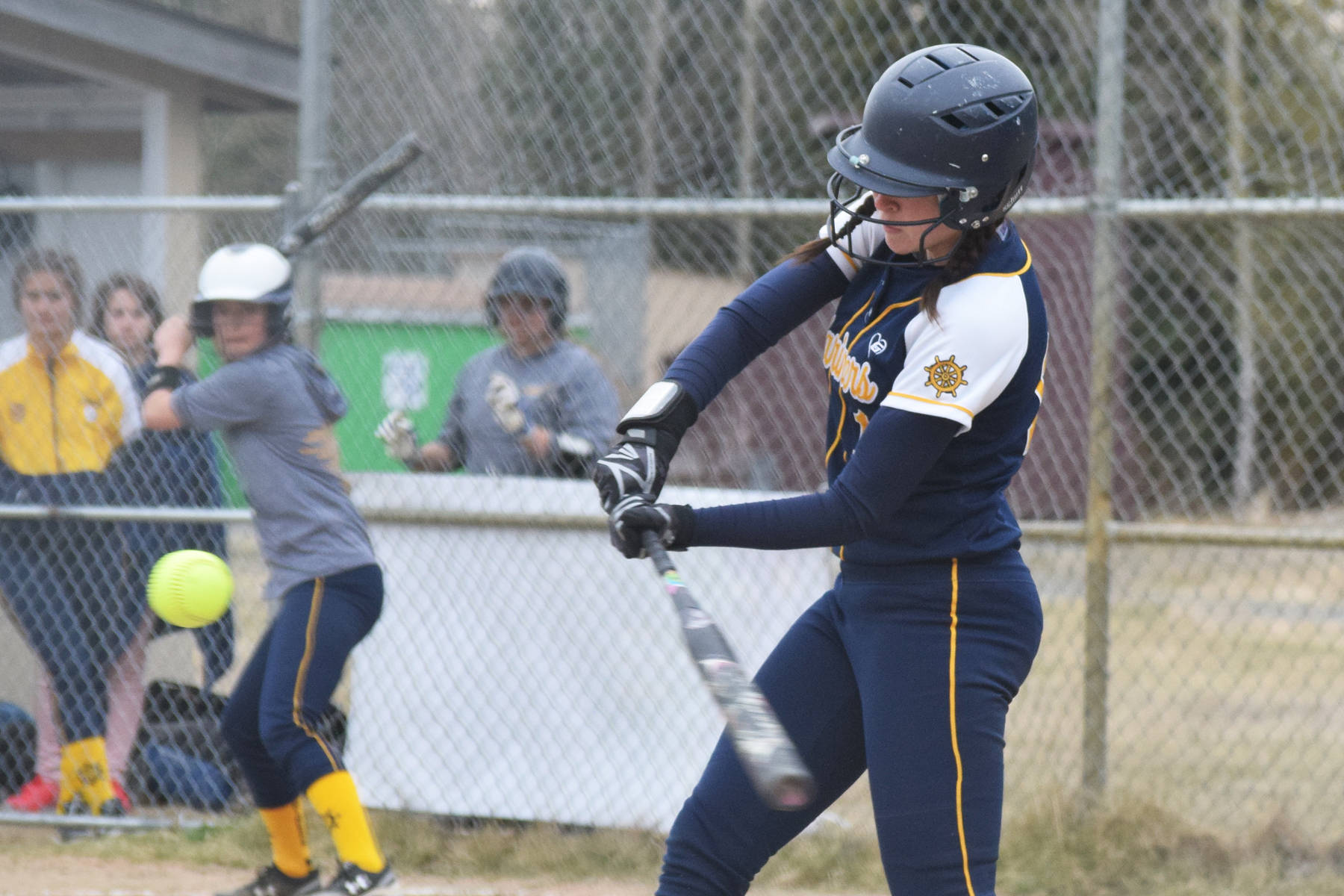 Homer’s Grace Godfrey takes a swing at a pitch in a conference game against Soldotna, Tuesday, May 7, 2019, at the Soldotna softball fields. (Photo by Joey Klecka/Peninsula Clarion)