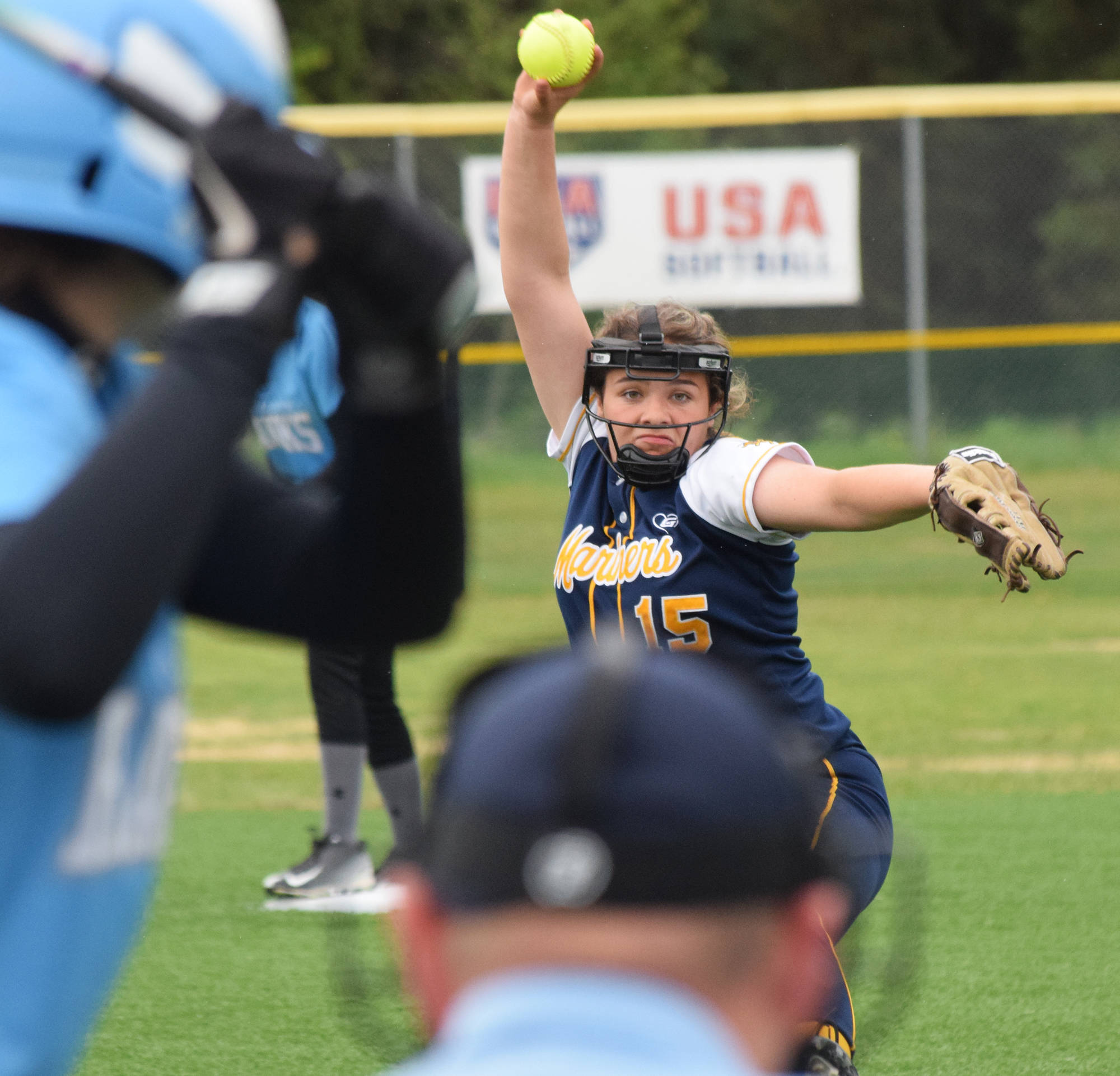 Homer’s Zoe Adkins offers up a pitch to a Hutchison batter Thursday, May 30, 2019, at the Div. II state softball tournament at Cartee Fields in Anchorage, Alaska. (Photo by Joey Klecka/Peninsula Clarion)